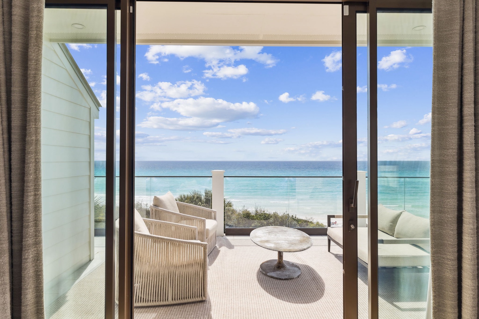 Step onto your private terrace where turquoise waters and endless ocean views create your perfect sanctuary for morning coffee or sunset cocktails.