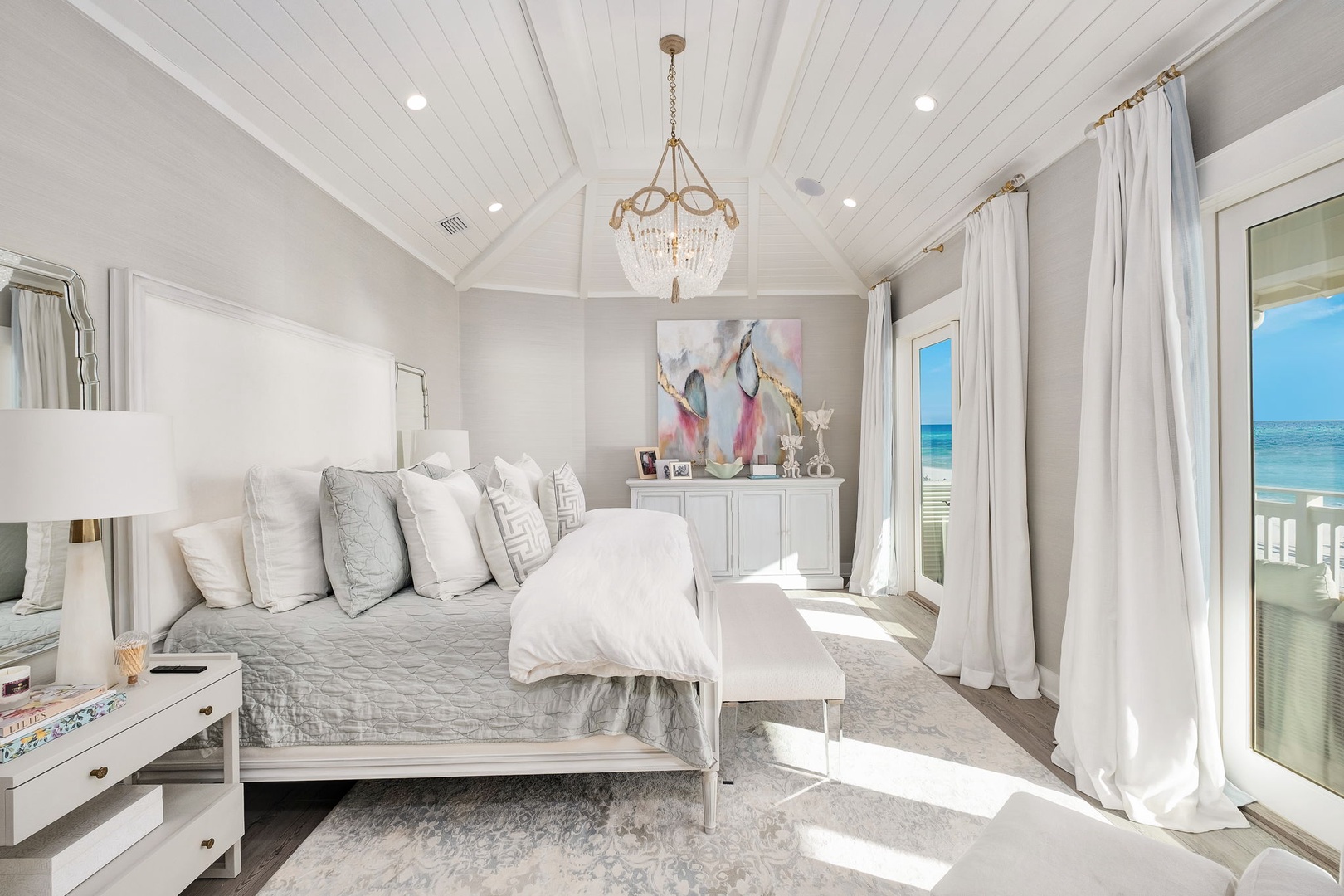 Drift off in this serene coastal retreat, where soft linens and ocean breezes through floor-to-ceiling windows promise your most restful mornings yet.