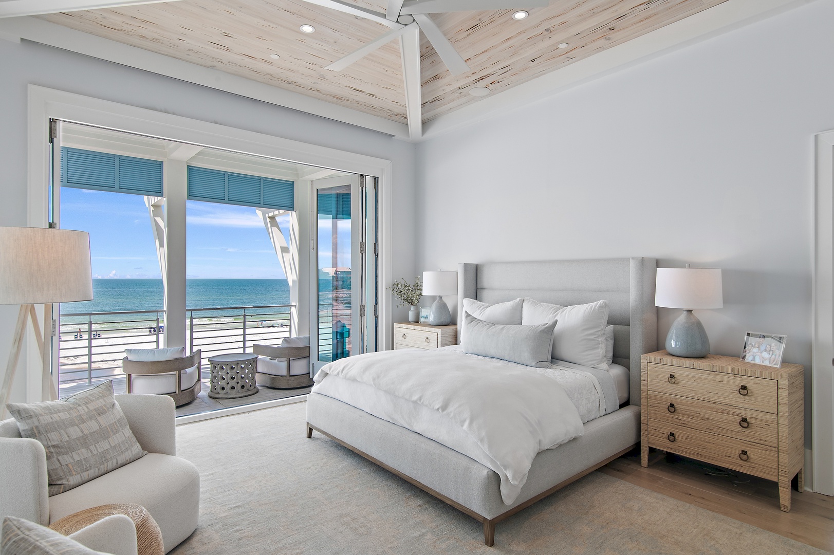Wake up to the peaceful sight of turquoise waters right outside your window. This serene bedroom invites you to unwind in coastal elegance, with breezy views and soft, calming tones that make every morning feel like a getaway.