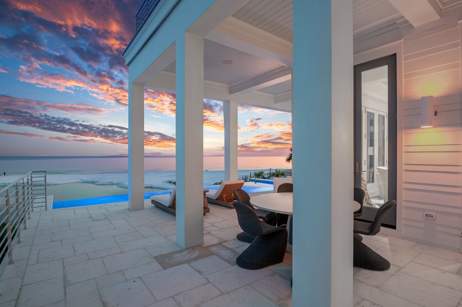Watch spectacular sunsets paint the sky in brilliant colors as you relax on your private covered terrace, complete with a pool and oceanfront views just steps away.