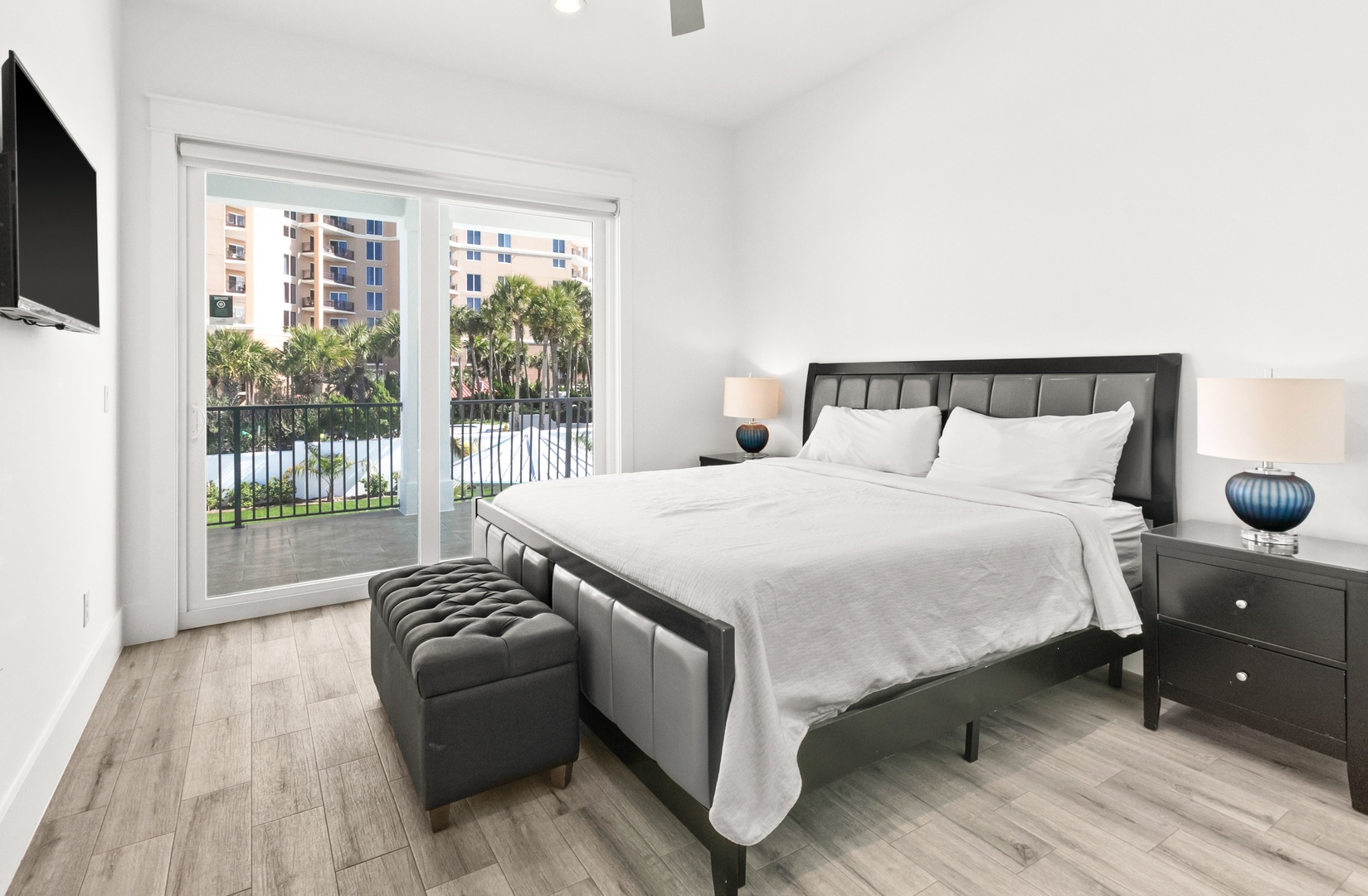 Step into your bright, modern bedroom with elegant furnishings and crisp linens. Open those sliding glass doors to your private balcony and feel the warmth of the coastal breeze welcome you home.