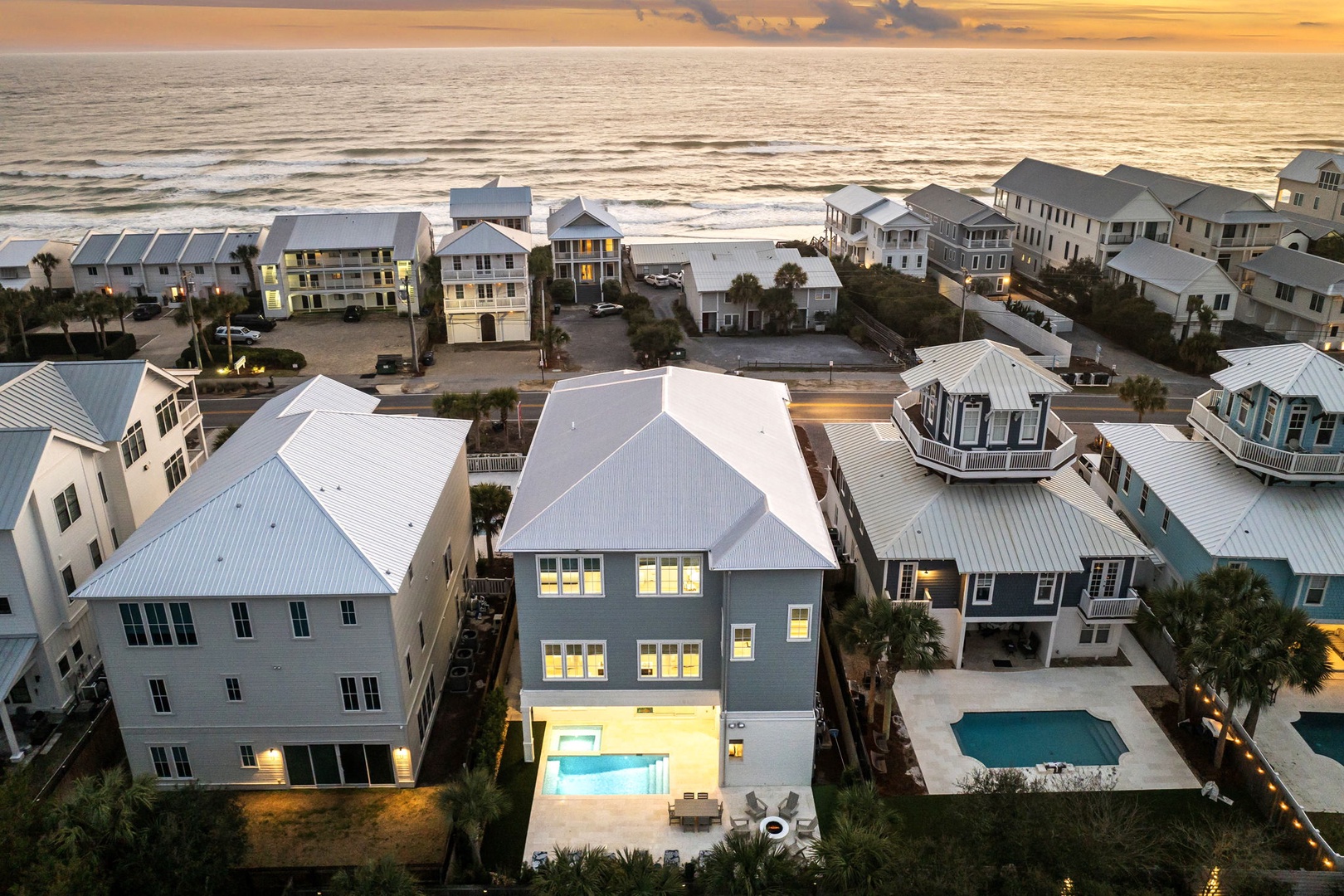 Stunning beachfront community featuring luxury vacation rentals with private pools just steps from pristine sandy shores and golden sunsets.