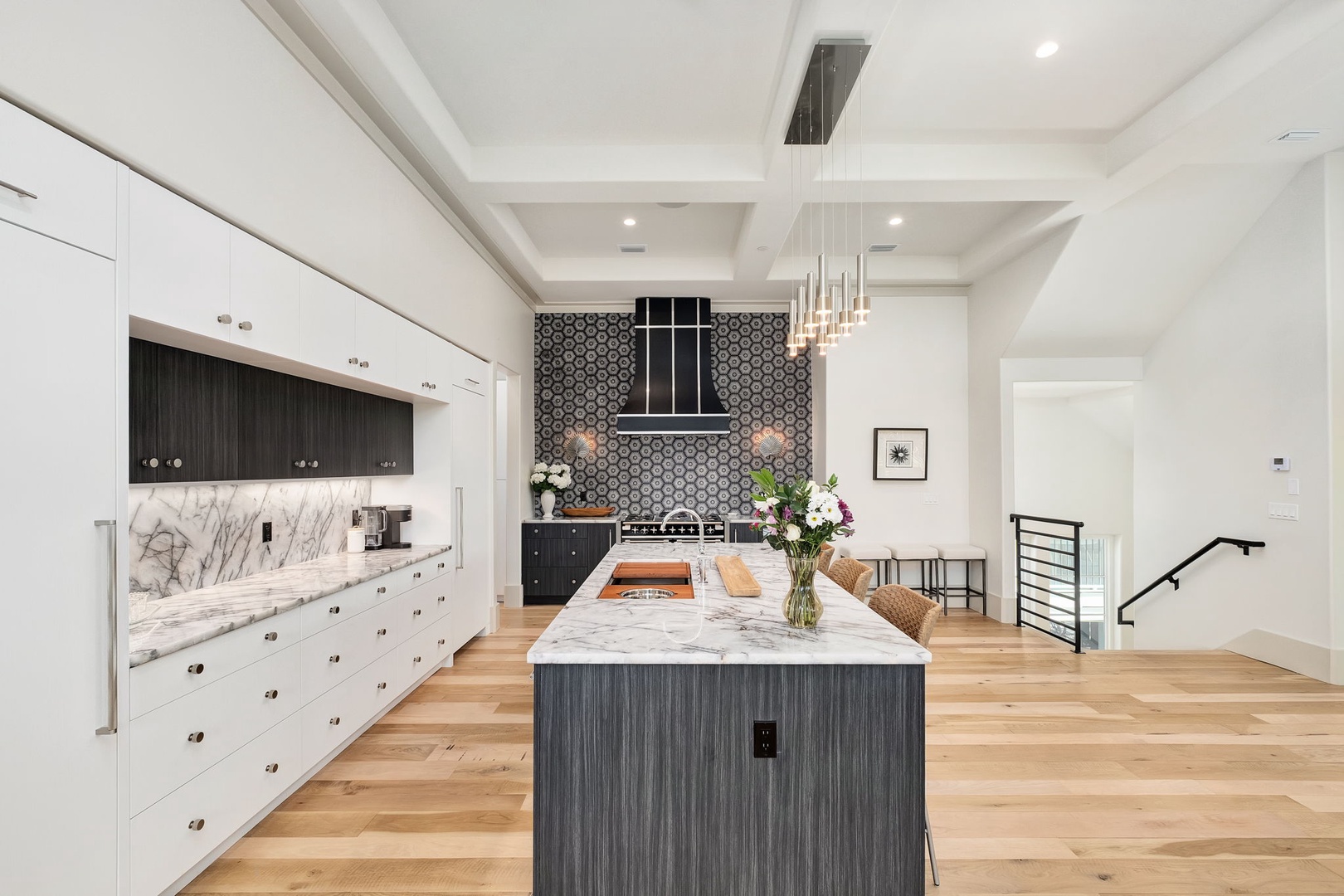 Your gourmet kitchen awaits with marble countertops, premium appliances, and a stunning island perfect for culinary adventures.