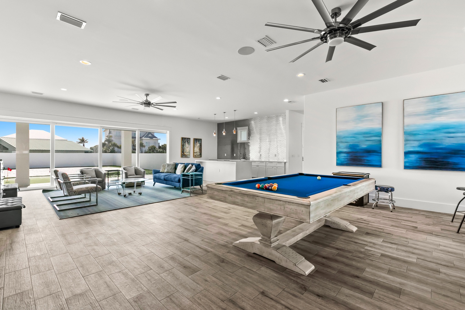 Challenge your friends to a game of pool in this bright, modern lounge space. Comfortable seating and sleek finishes invite you to unwind and enjoy friendly competition.