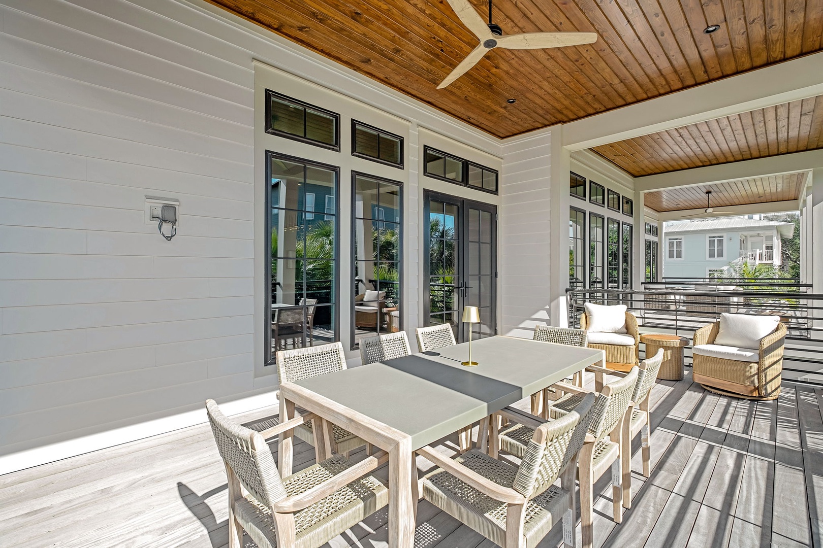Your expansive covered terrace offers dining for eight plus lounge seating, all under beautiful wood ceilings with ceiling fans for comfort.