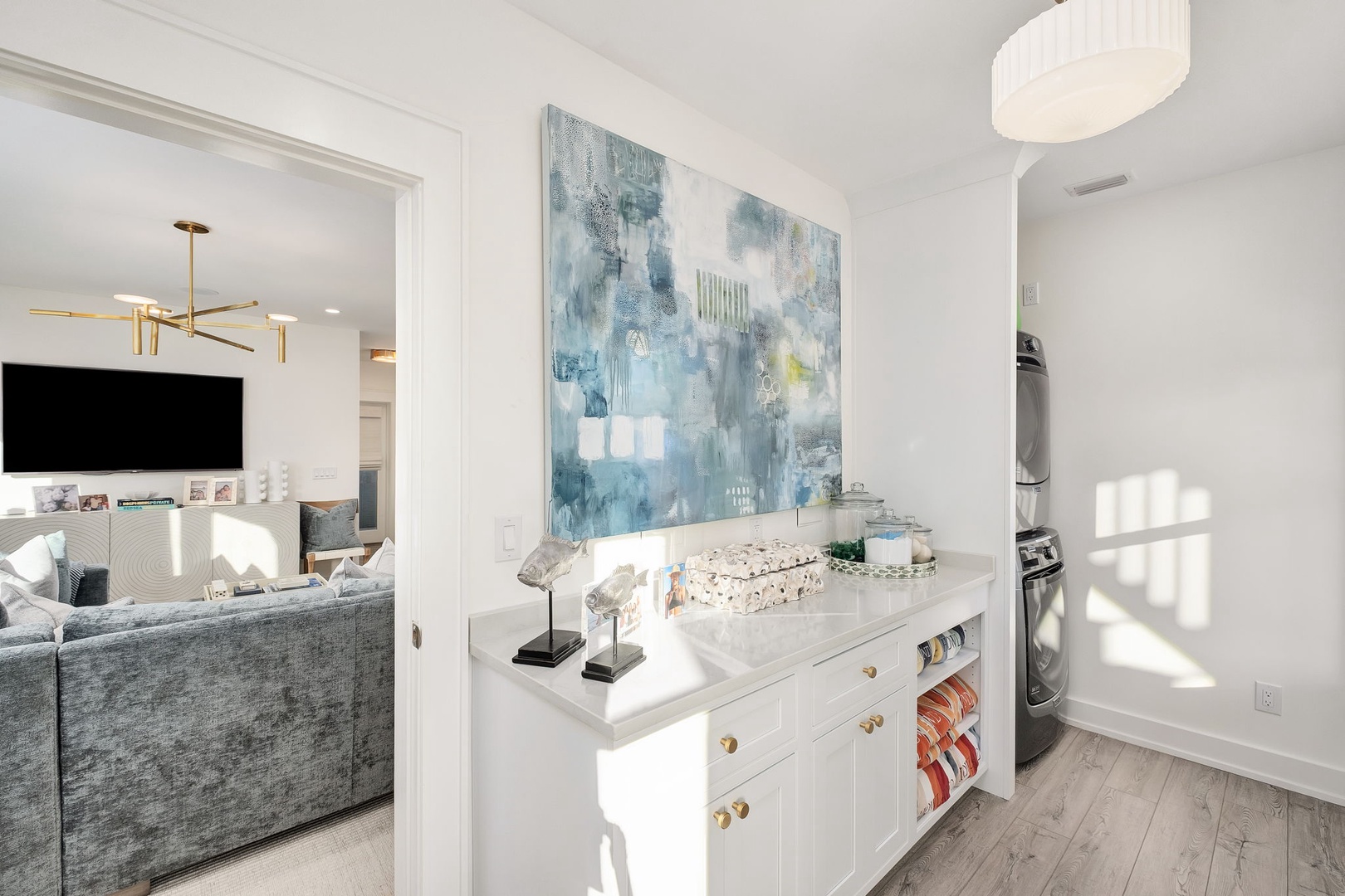 Bright, open-concept space connecting your living area to a chic hallway console—perfect for displaying treasures and keeping essentials close at hand.