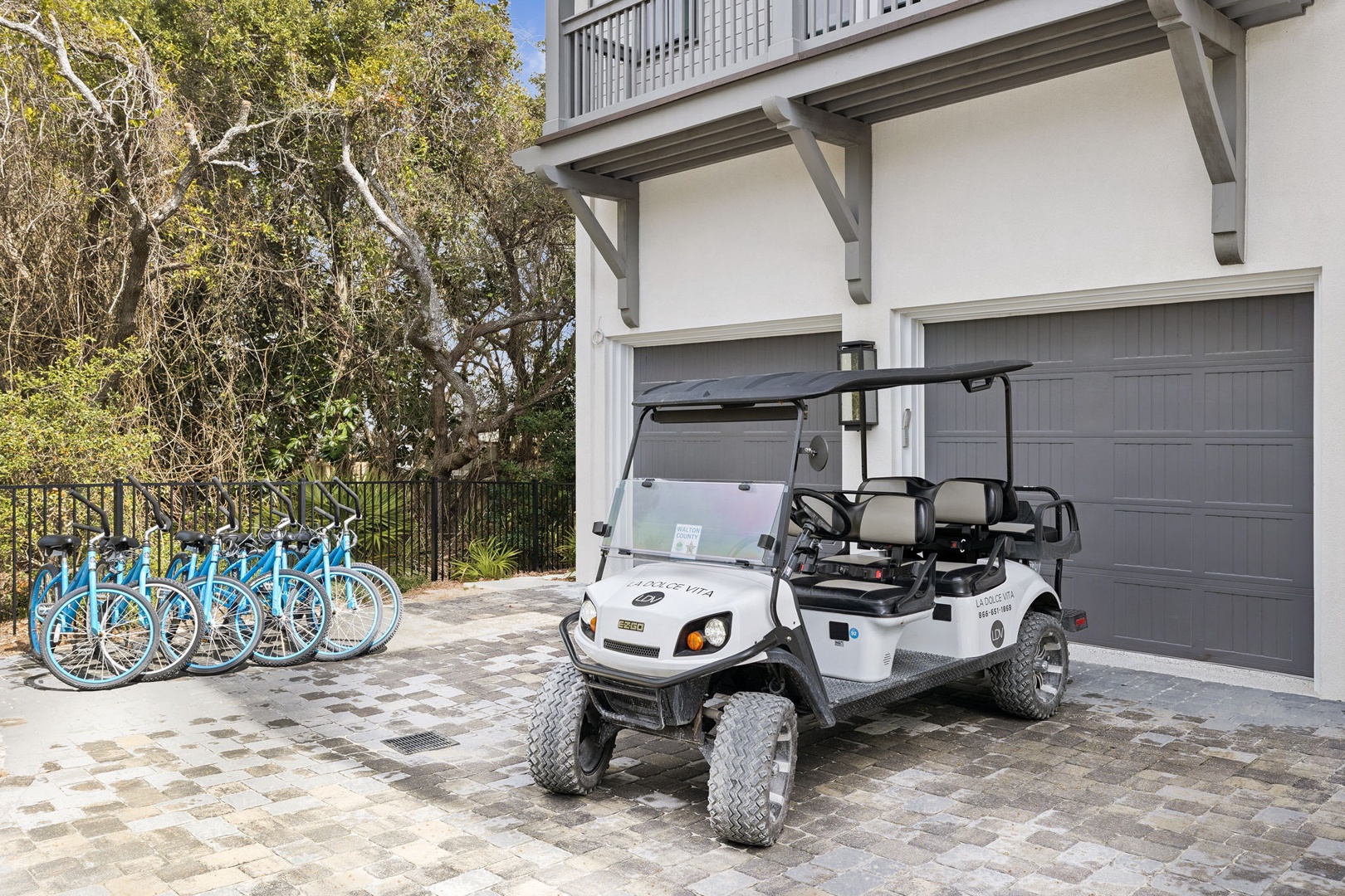 Property features convenient transportation options with complimentary bikes and golf cart access for easy exploration of the area.