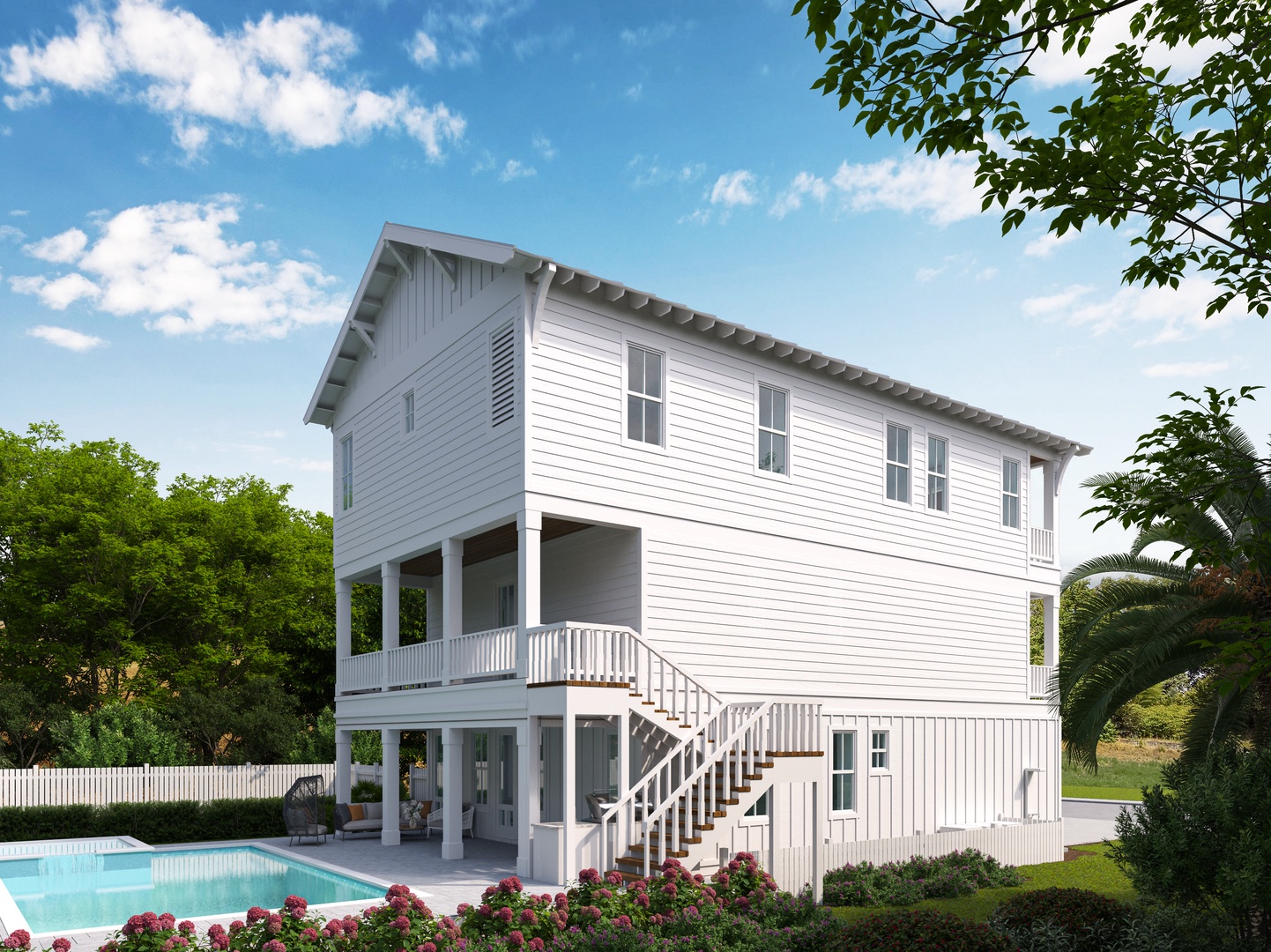 Charming three-story beach house with private pool and tropical gardens set against blue skies.