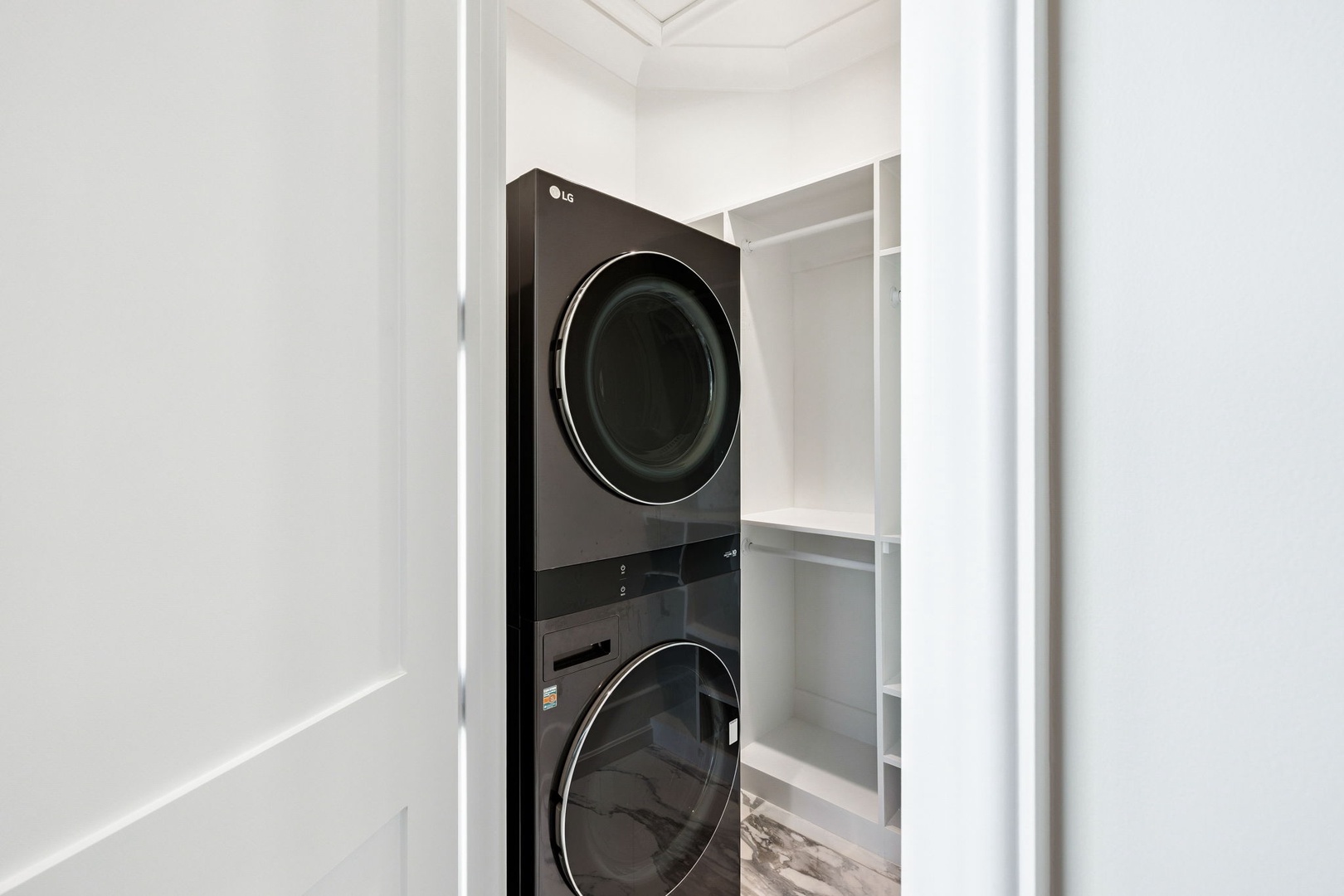 Your in-unit stacked washer and dryer keeps your wardrobe fresh throughout your stay, with built-in storage for convenience.