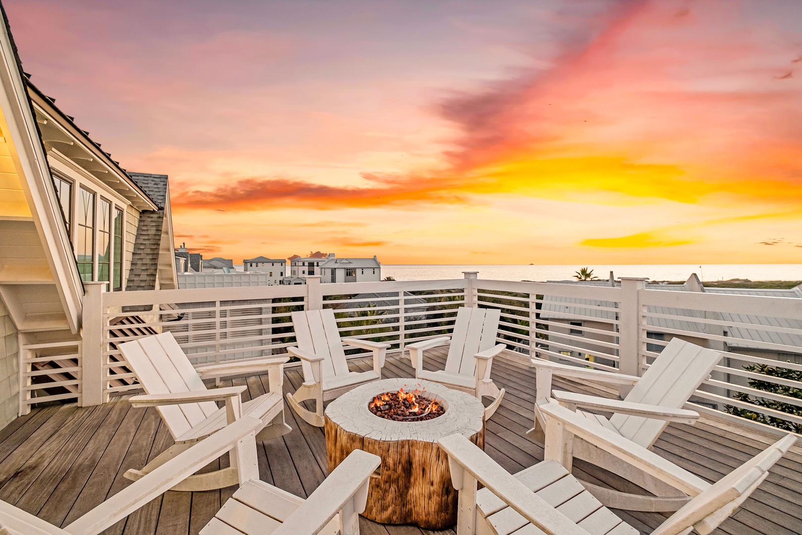 Gather around the rooftop fire pit as vibrant sunset colors paint the sky, creating perfect moments for evening conversations.
