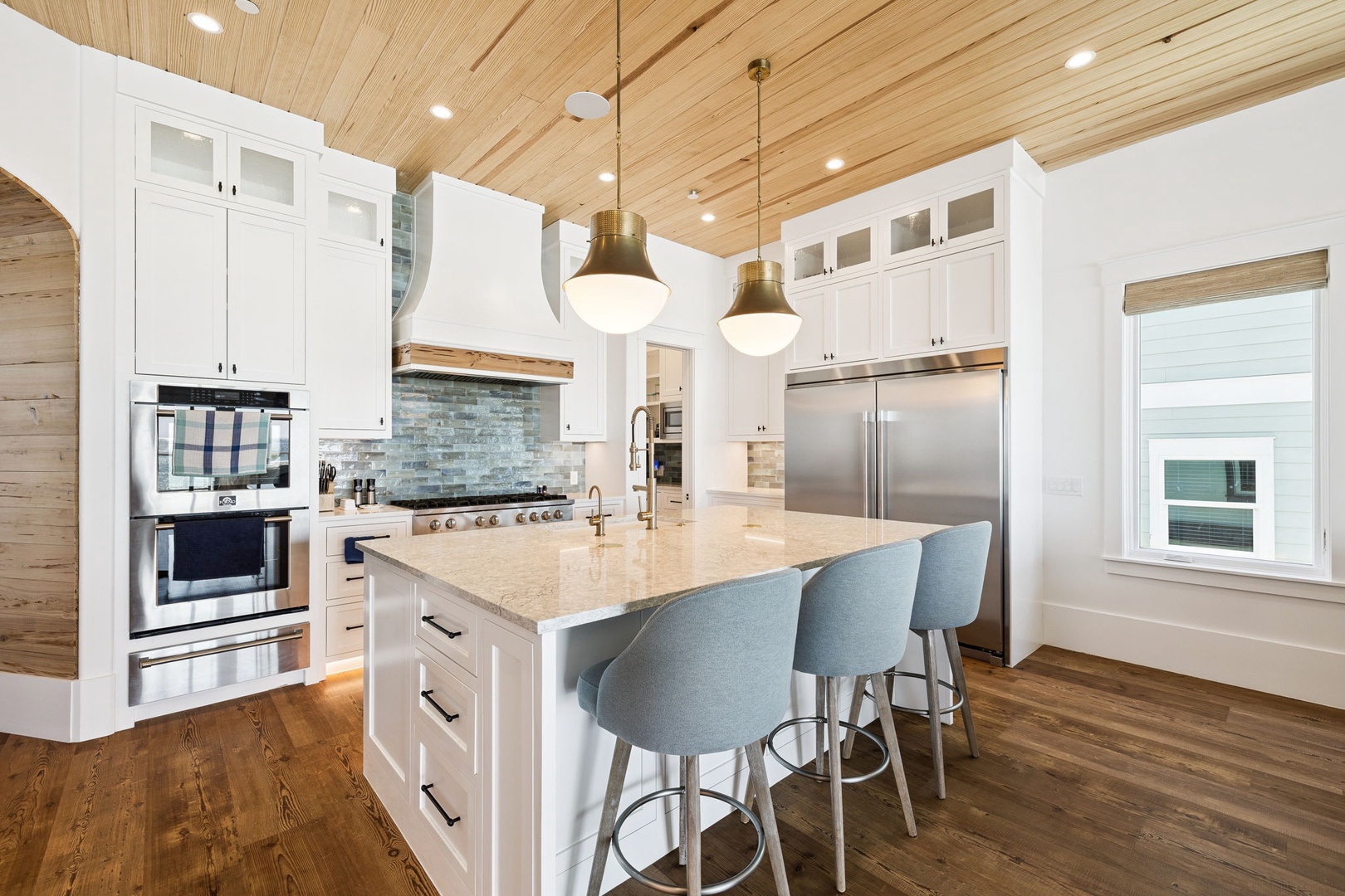 Your gourmet kitchen awaits with marble countertops, premium appliances, and a spacious island perfect for cooking and gathering.