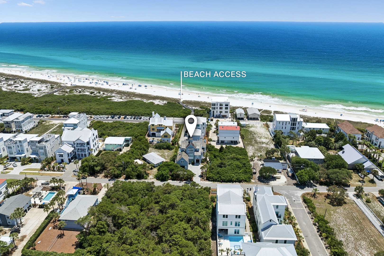 Coastal neighborhood with direct beach access, just steps from stunning turquoise waters and white sand shores. Ideal location for a relaxing getaway by the sea.