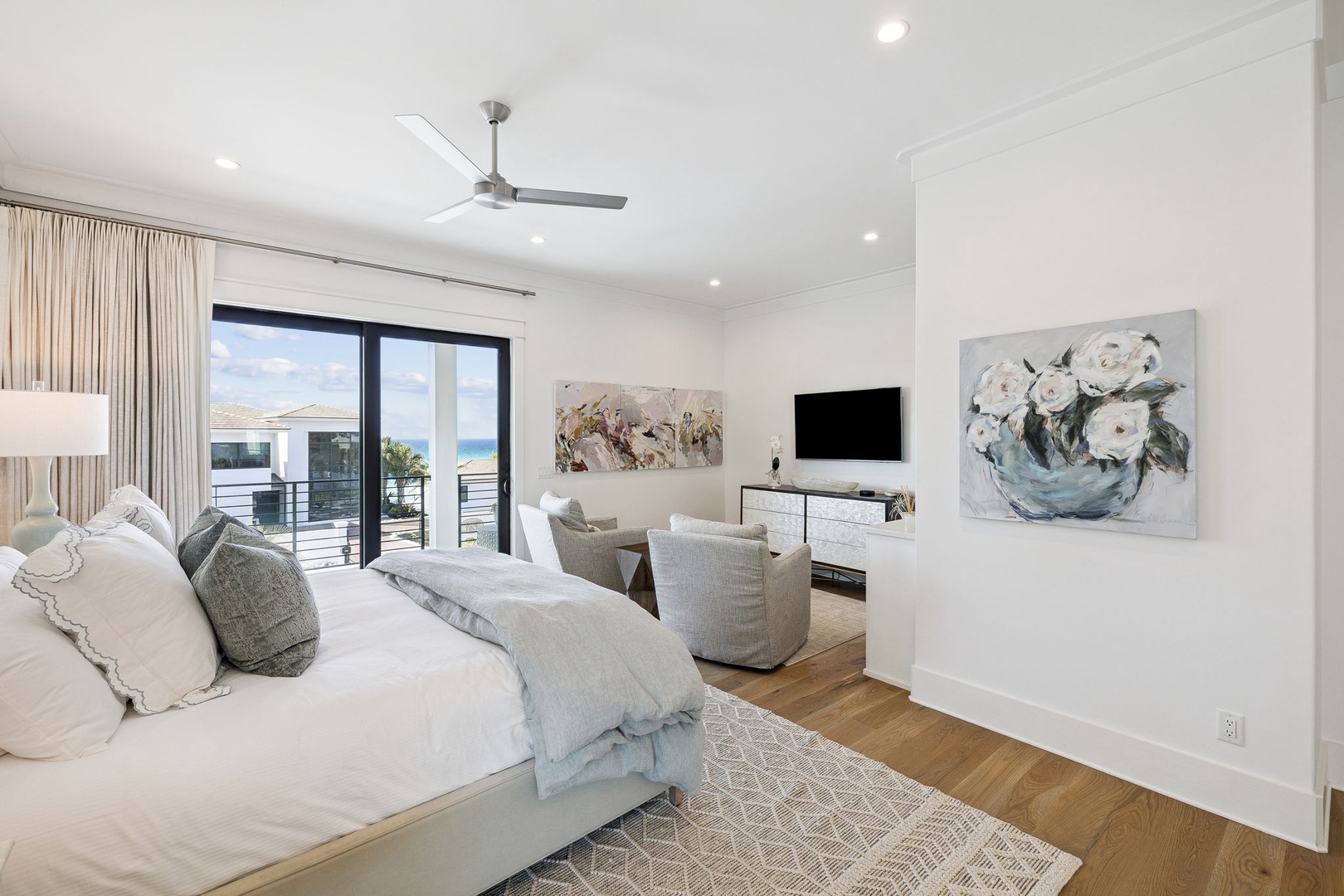 Wake up to ocean breezes in your luxurious bedroom suite, complete with plush linens, modern art, and stunning coastal views.