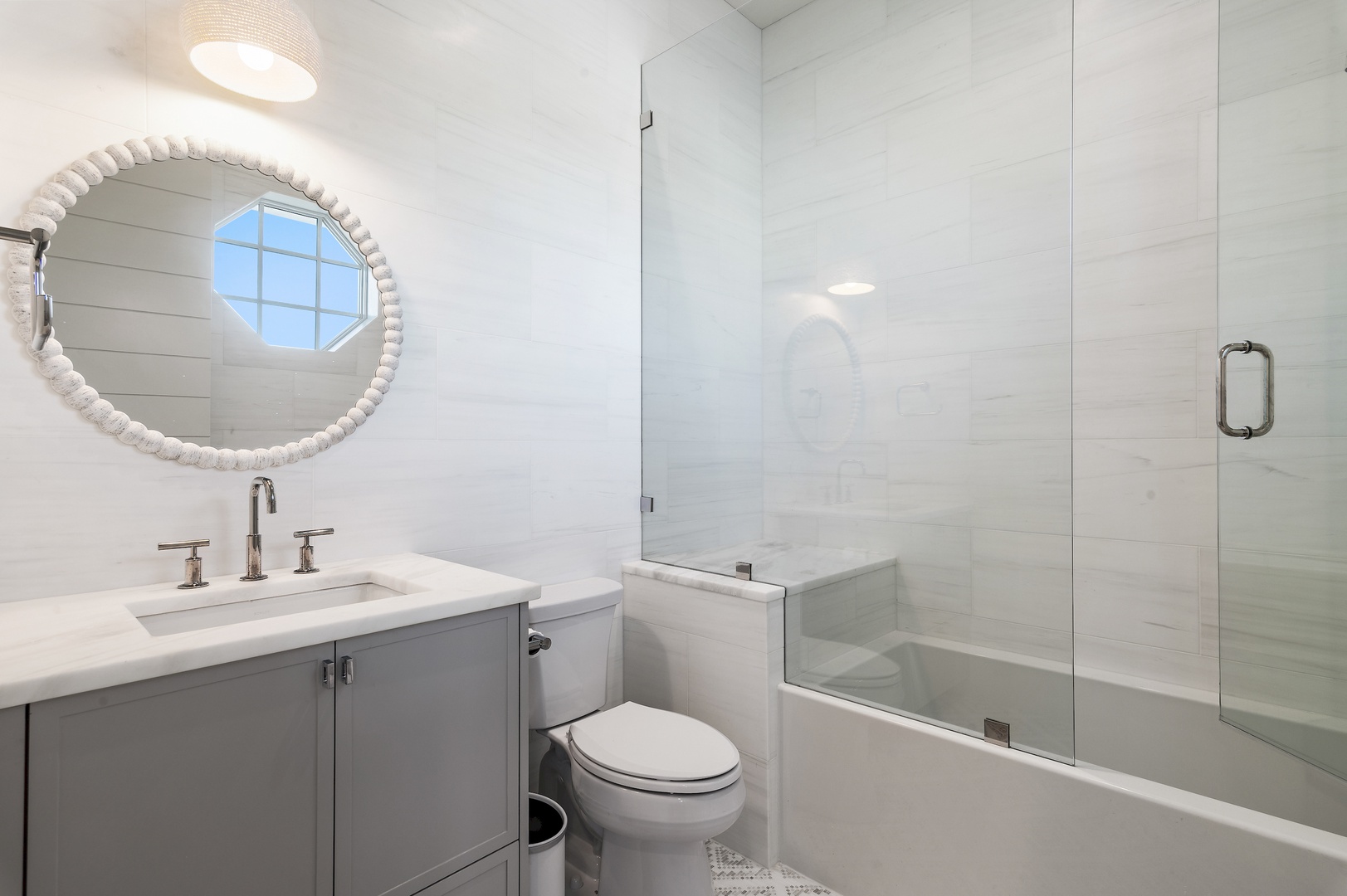 Step into your serene, spa-like bathroom where soft lighting and clean lines create a calming retreat. The soaking tub invites you to unwind after a day of adventure.