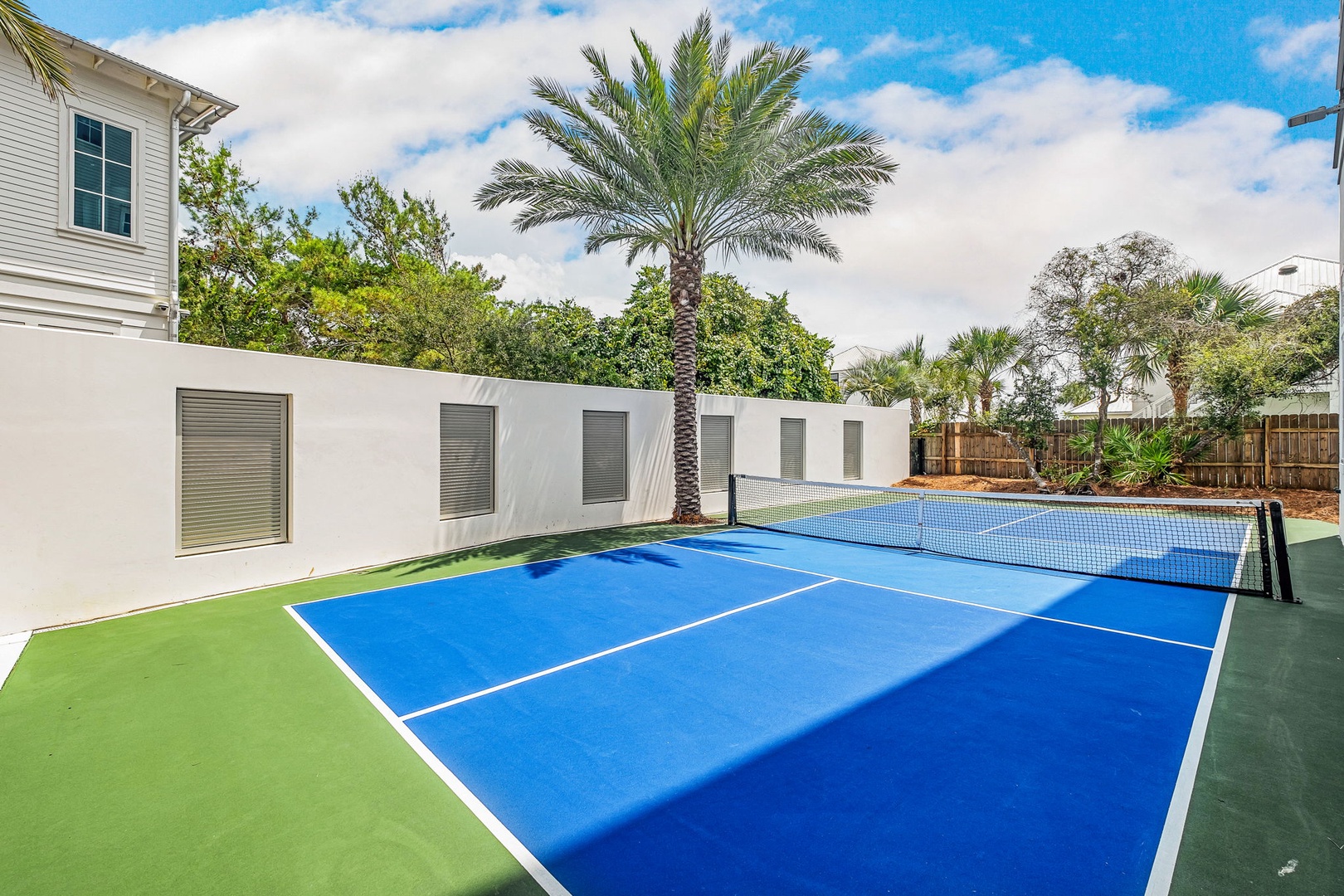 Game, set, match! Your private tennis court awaits, nestled under swaying palms and sunny skies—perfect for morning rallies or afternoon fun with friends and family.