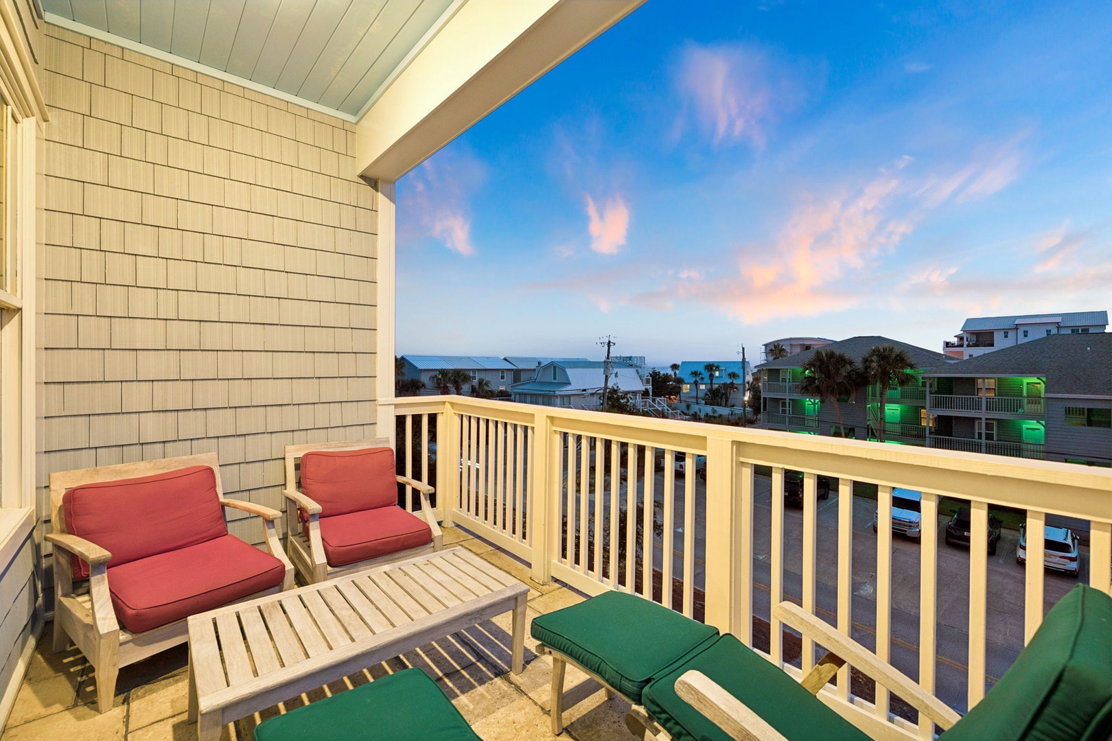 Unwind on your private balcony with comfortable seating and a glimpse of the ocean beyond. Soft morning light and coastal breezes create the perfect spot for your morning coffee or evening relaxation.