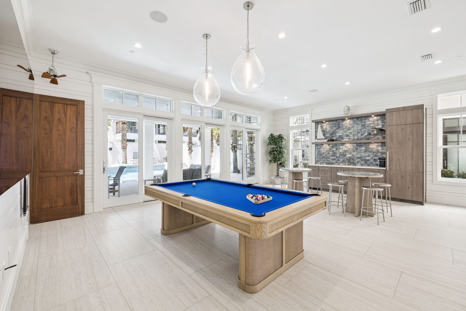 Challenge friends to pool while enjoying the open kitchen bar area perfect for entertaining and socializing.