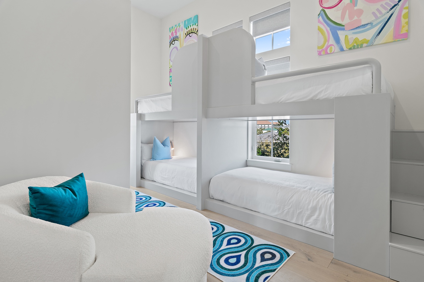 Bright bunk beds and playful decor create a fun space where your kids can rest and bond during your getaway.