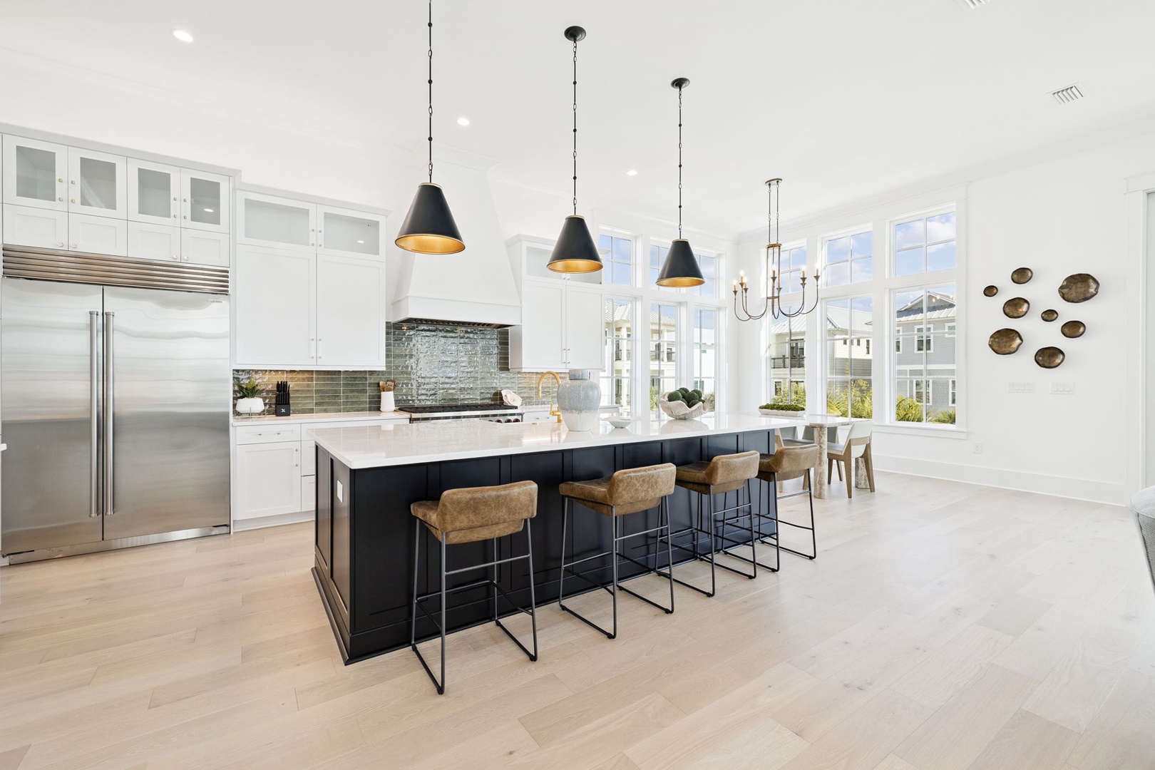 Your gourmet kitchen awaits with marble countertops, pendant lighting, and bar seating for memorable meals together.