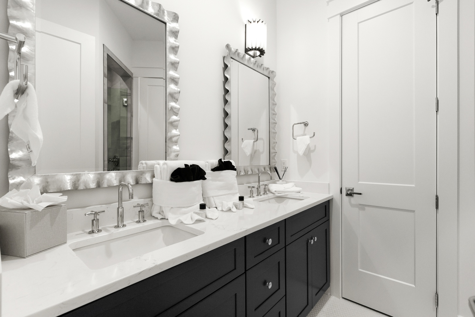 Refresh in your elegant double-vanity bathroom, where plush towels and thoughtful details await your arrival.