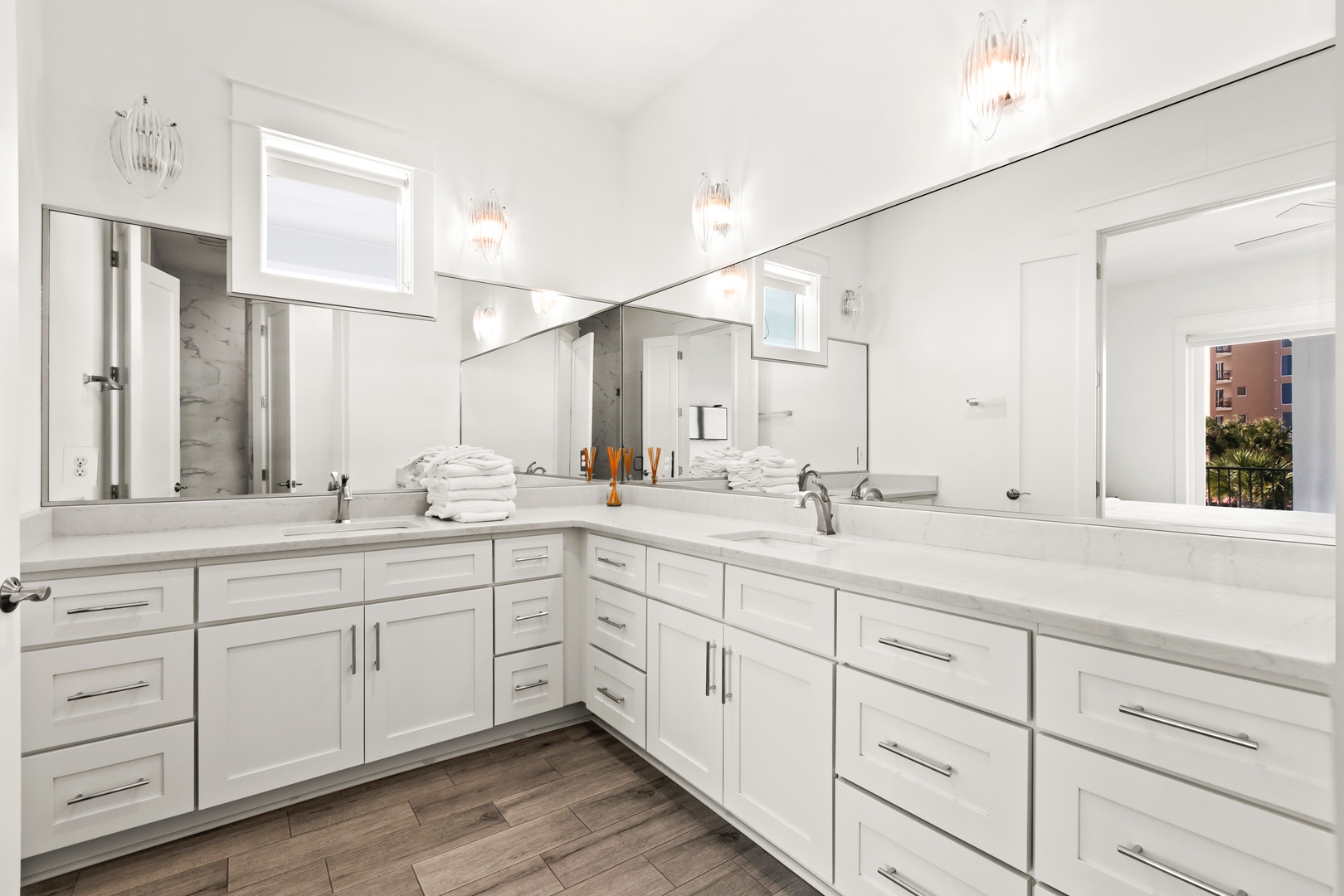 Freshen up in your elegant dual-sink vanity—bright, spacious, and beautifully designed to start your day feeling pampered.