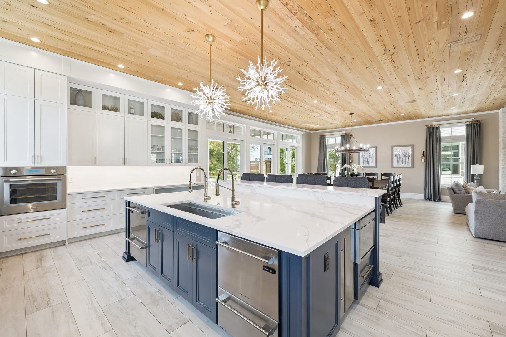 Your dream chef's kitchen awaits with stunning wood-beamed ceilings, granite countertops, and gleaming appliances perfect for creating memorable meals.
