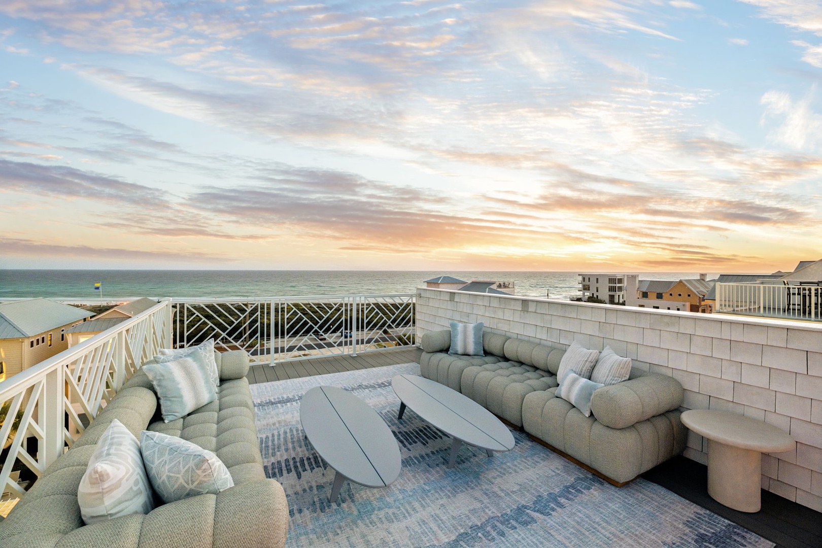 Unwind on your private rooftop terrace with plush seating while golden sunsets paint the ocean horizon in breathtaking colors.