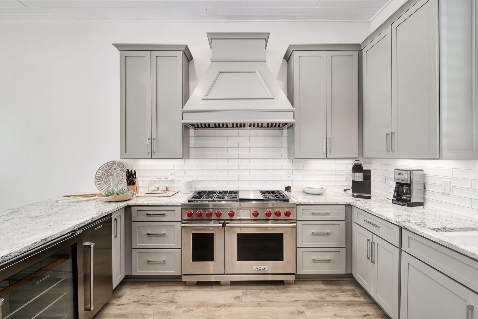 Your gourmet kitchen features professional-grade appliances and elegant marble countertops for memorable cooking experiences.