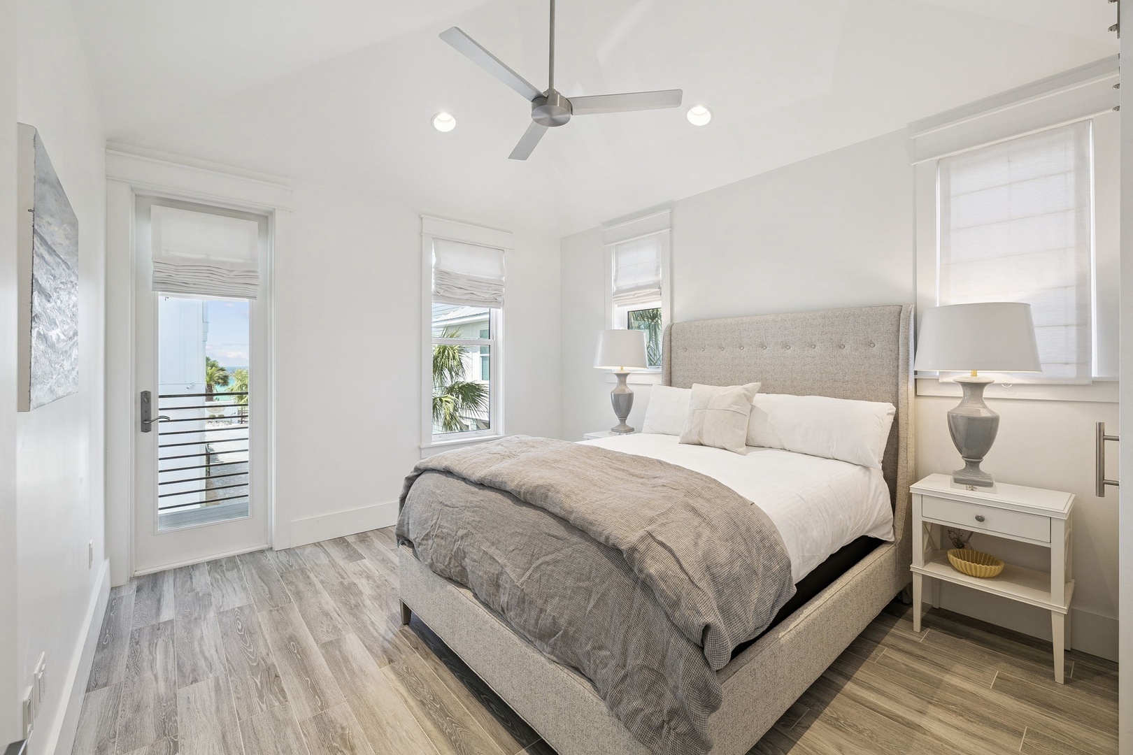 Drift off in your serene bedroom sanctuary, where soft linens and coastal breezes create the perfect retreat for restorative nights.