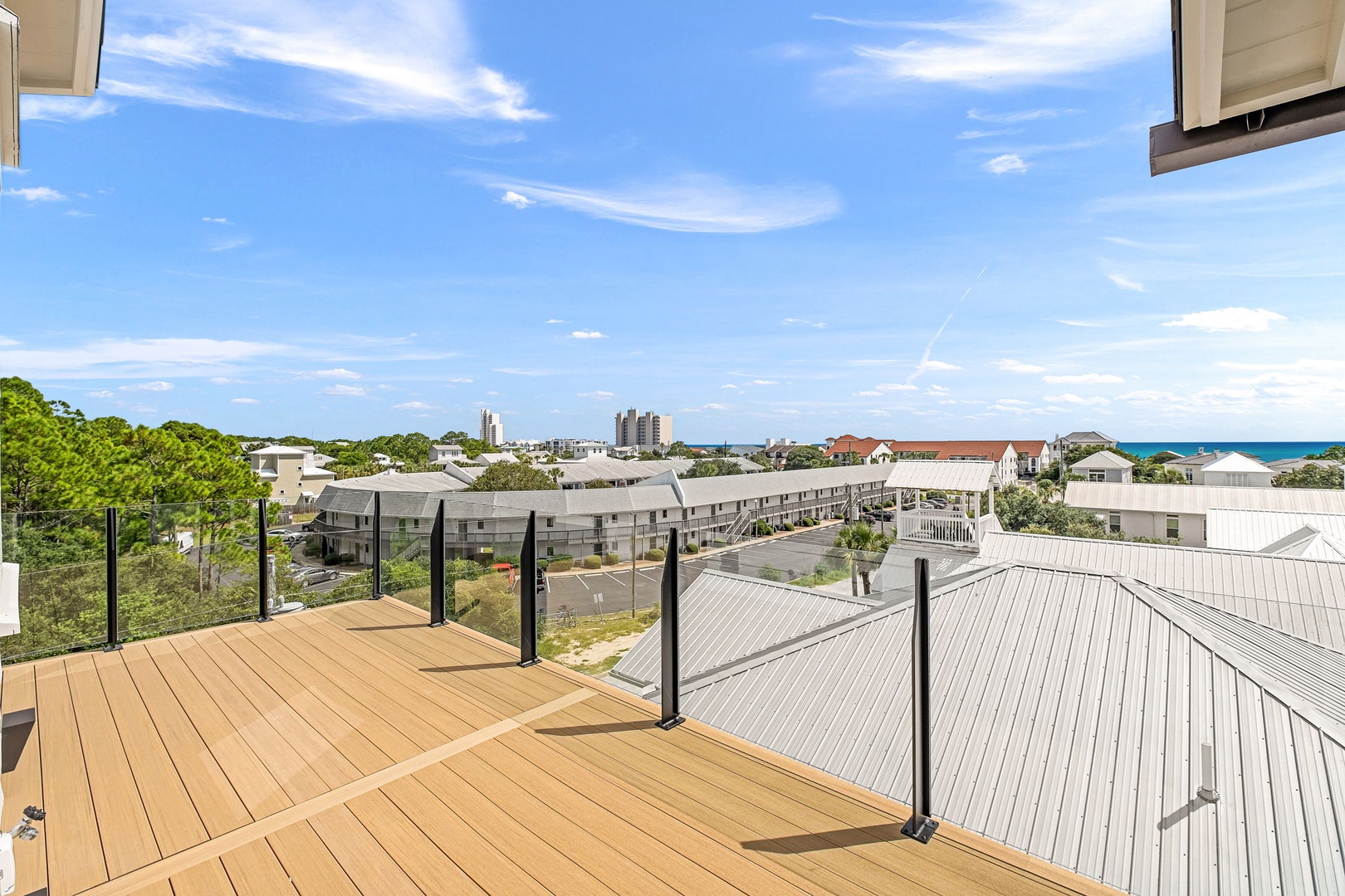 Soak in breathtaking ocean views from your private rooftop deck, where turquoise waters meet coastal charm and endless blue skies—a perfect spot to unwind with morning coffee or evening sunsets.