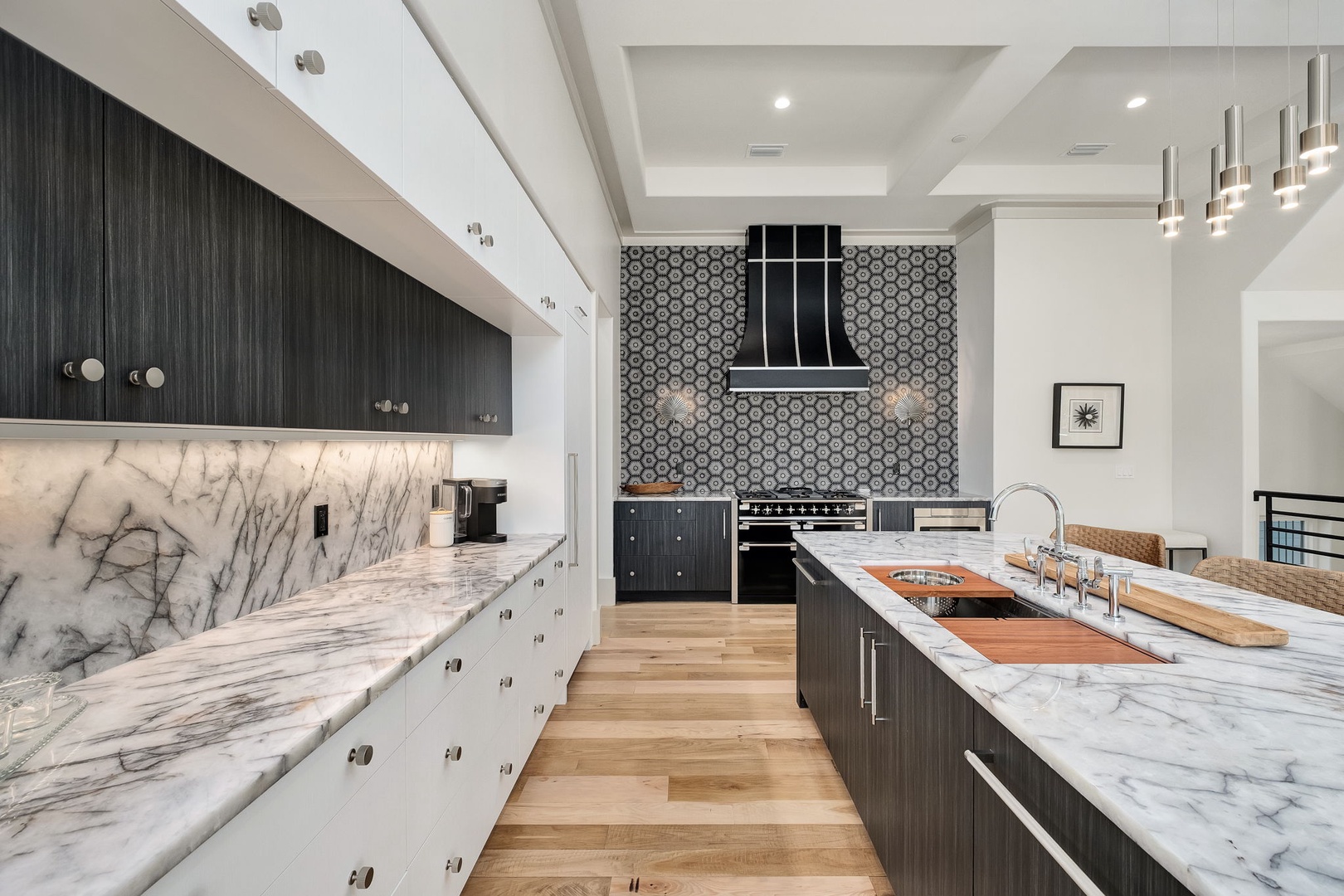 Your gourmet kitchen awaits with marble counters, professional appliances, and an elegant island perfect for culinary adventures.