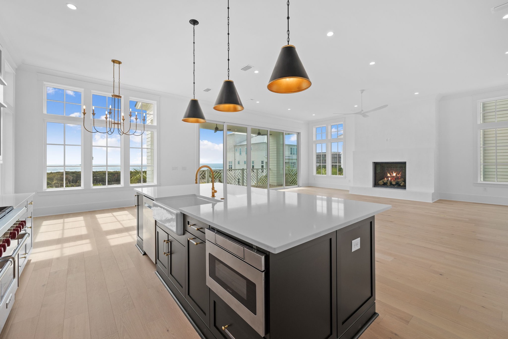 You'll love cooking in this stunning open kitchen, complete with a spacious island and elegant pendant lighting that sets the perfect ambiance.