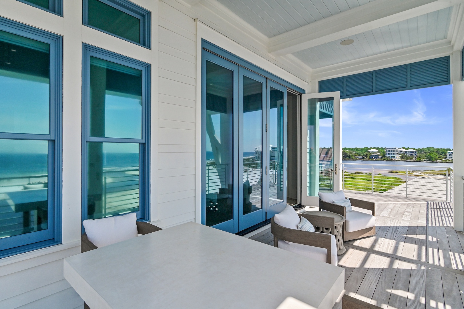 Step out onto your private balcony and take in peaceful waterfront views. Comfortable seating invites you to relax with morning coffee or evening cocktails while watching boats drift by.