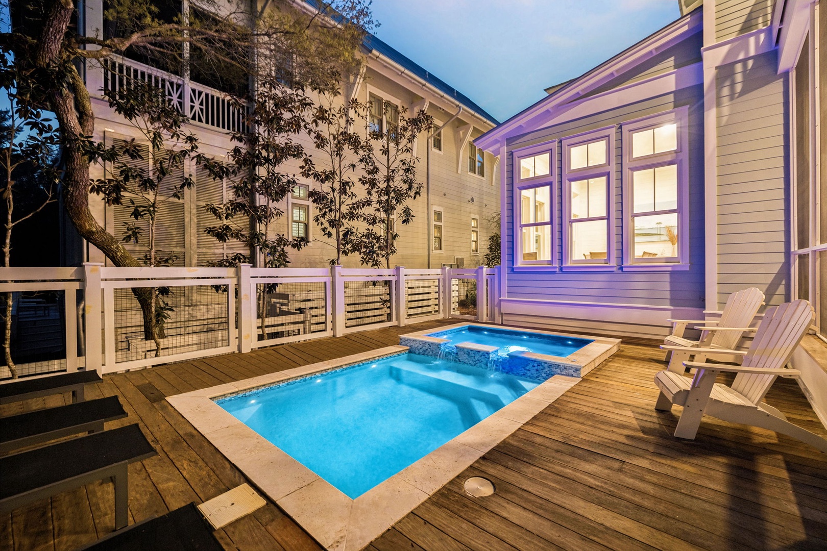 Slip into your private spa oasis at twilight, where warm deck chairs await beside the glowing pool and bubbling hot tub.