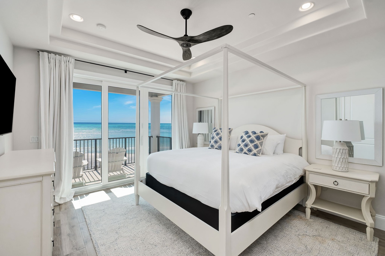 Wake up to endless ocean views in your serene canopy bed retreat, where soft sea breezes and stunning blue waters create the perfect coastal escape.