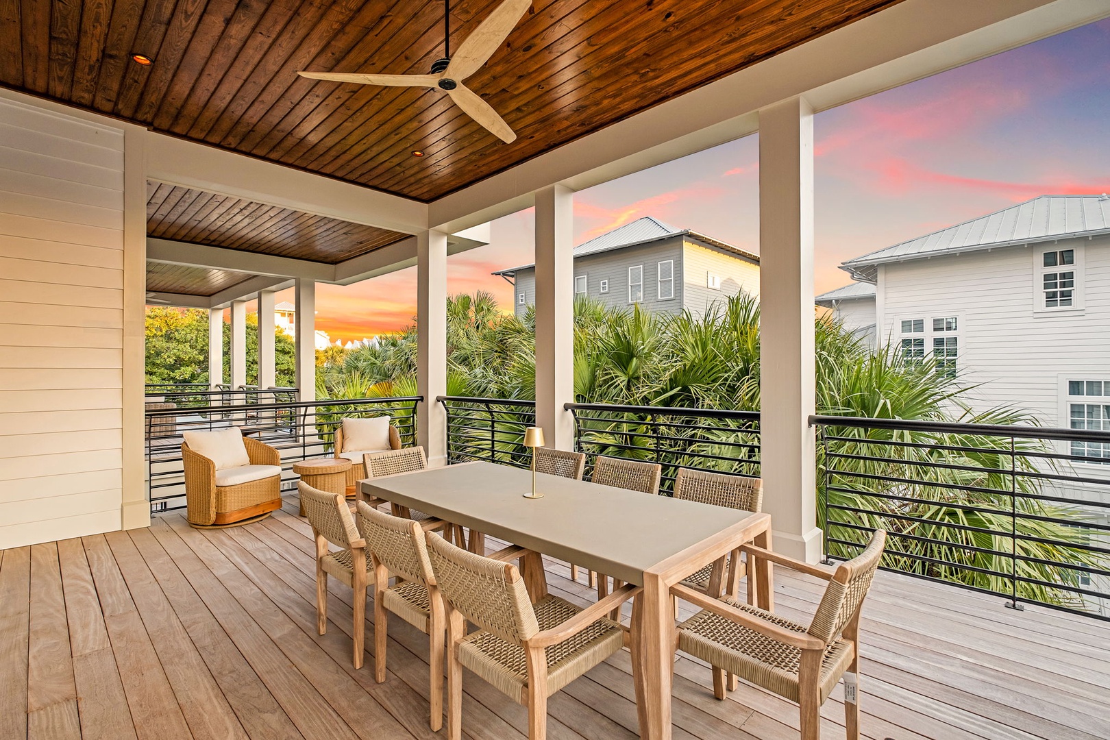 Gather for meals on your covered terrace as tropical sunsets paint the sky in brilliant colors above the palm trees.