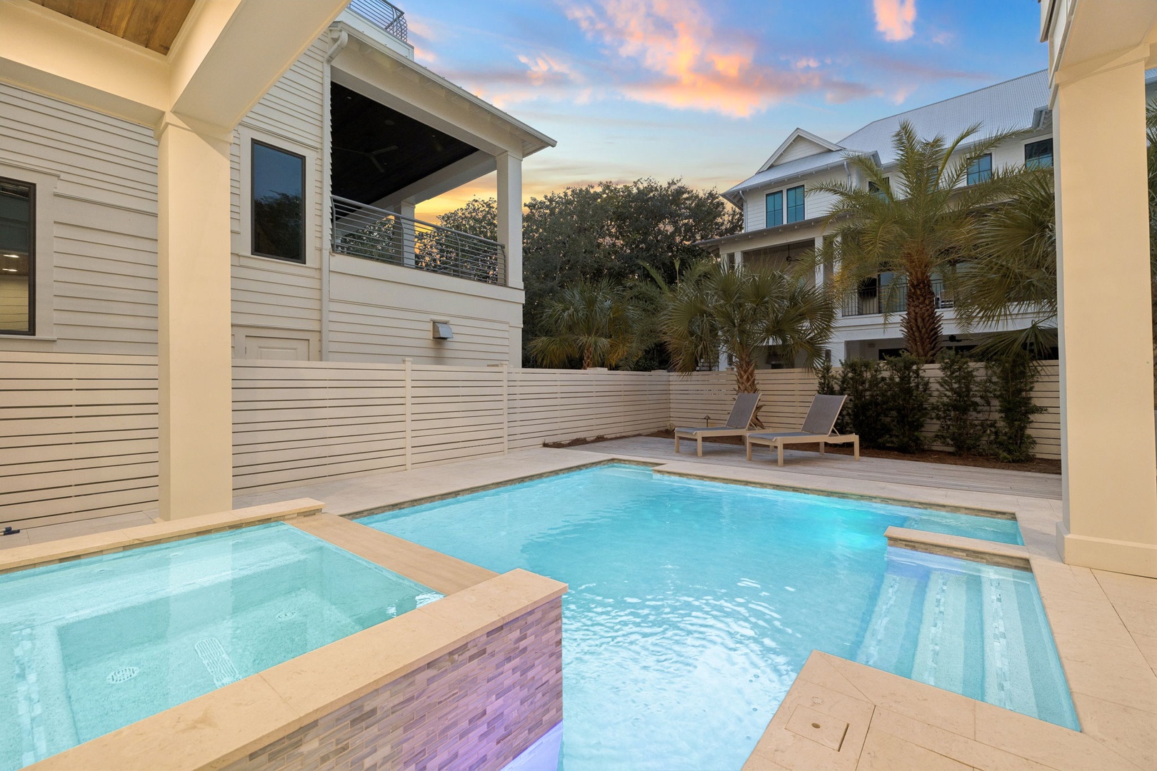 Slip into your private heated pool and spa as tropical palms sway overhead and sunset paints the sky.