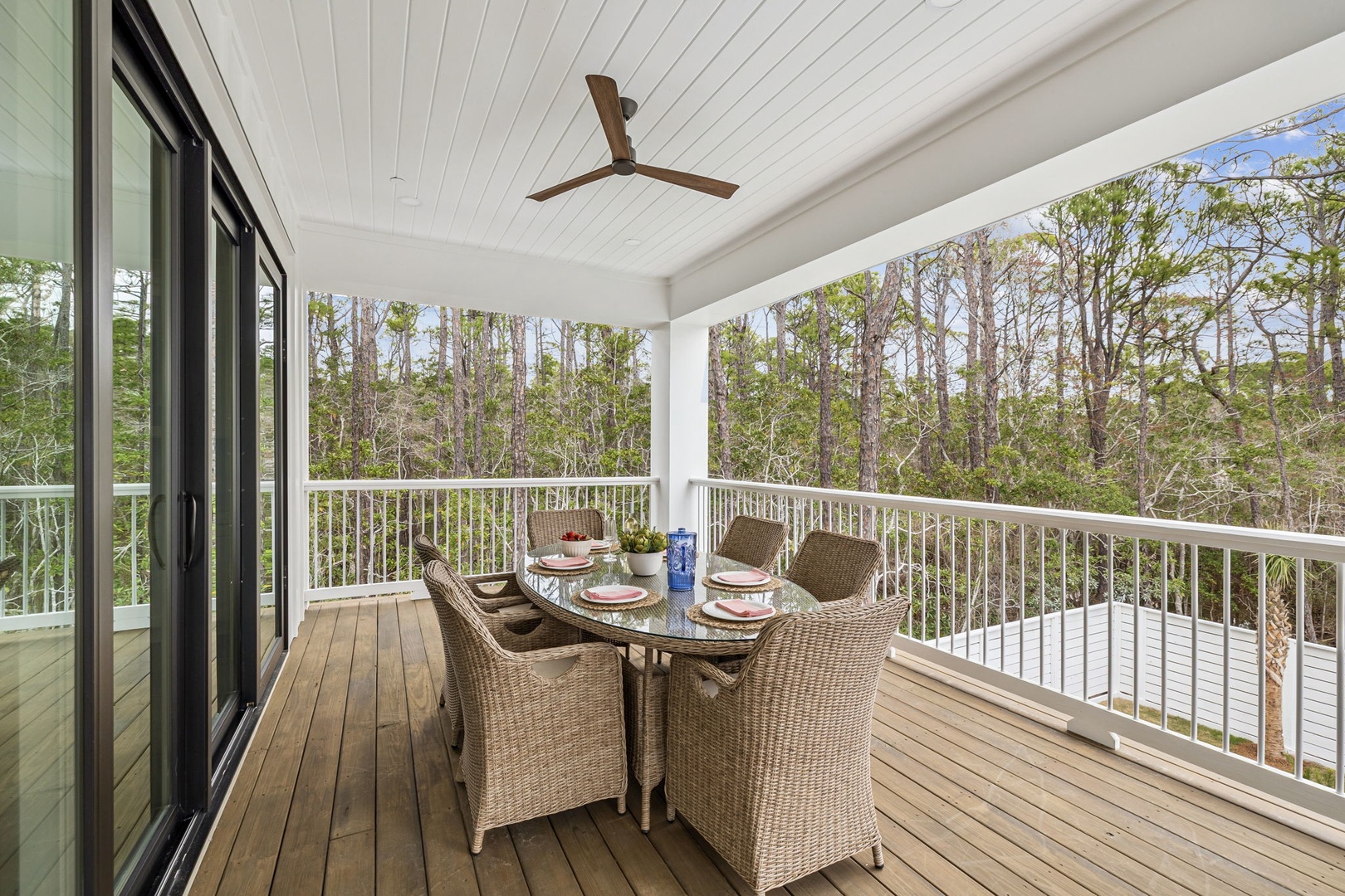Your covered deck offers peaceful forest dining with a ceiling fan breeze and natural tranquility.
