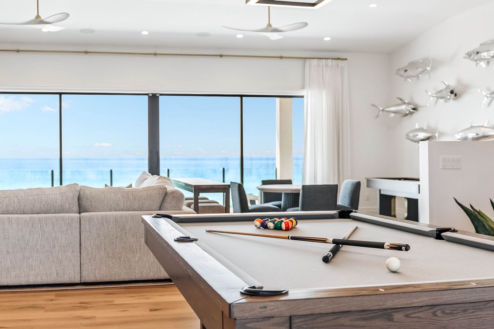 Unwind with a friendly game while taking in stunning ocean vistas—your beachside retreat offers the perfect blend of fun and relaxation.