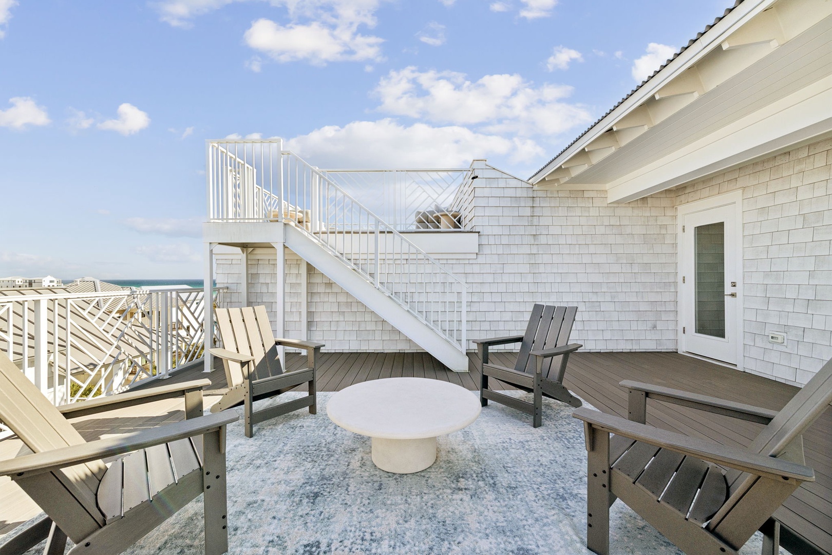 Unwind on your private deck with Adirondack chairs and ocean views, perfect for morning coffee or sunset cocktails.
