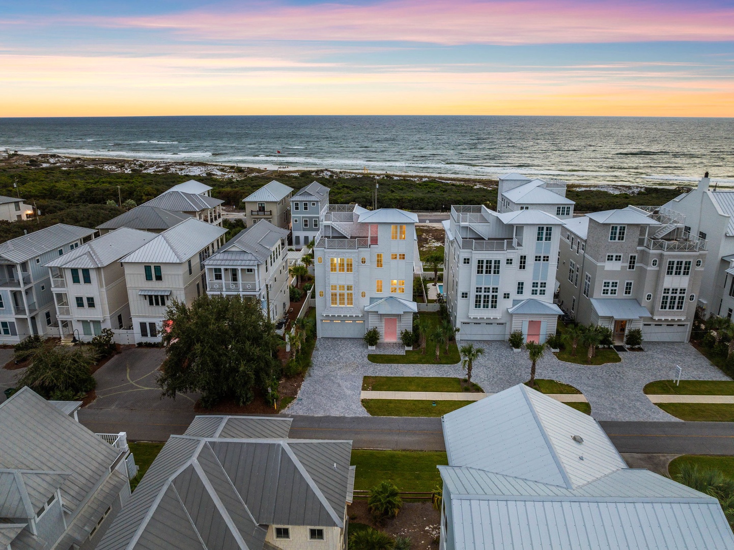 Beachfront community featuring modern coastal homes with ocean access just steps away.