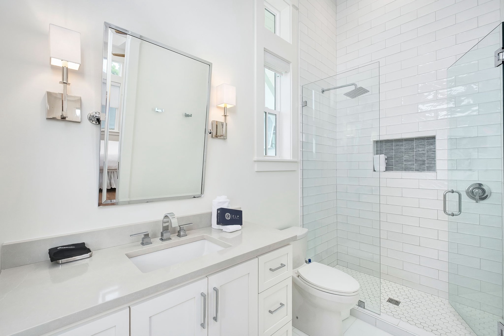Step into this beautifully designed bathroom where modern elegance meets comfort. The walk-in shower and sleek fixtures create your perfect retreat after a day of adventures.