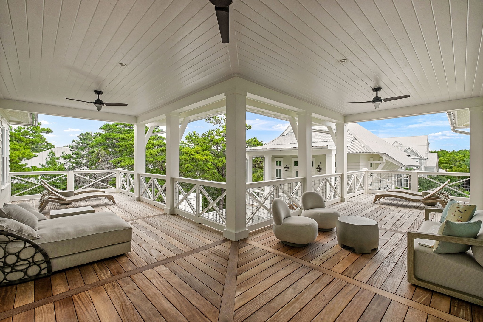 Sink into plush loungers on your covered deck while ceiling fans keep you cool and views of lush greenery surround you—the perfect outdoor retreat.