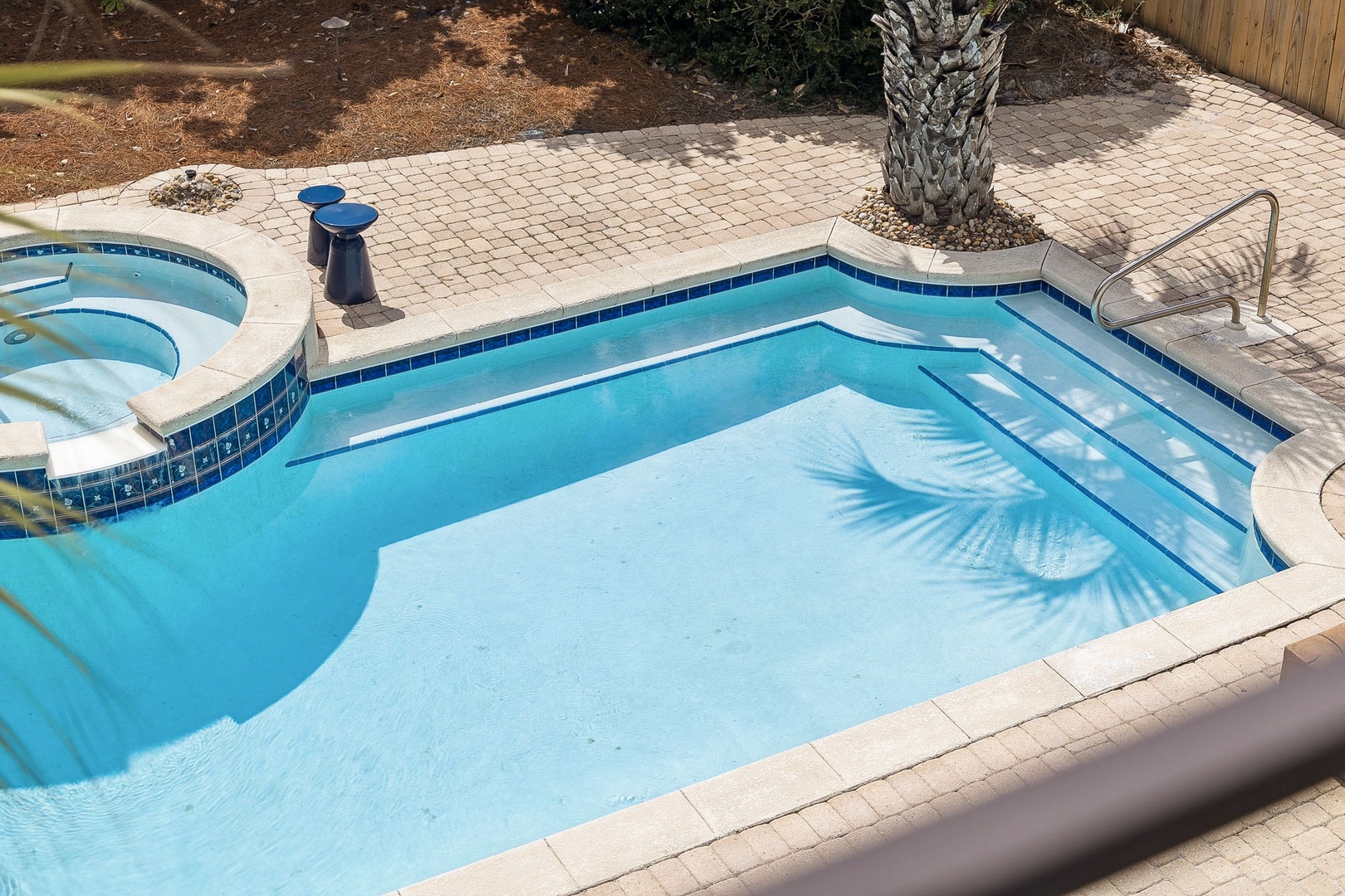 Dive into your private oasis with crystal-clear waters and a relaxing spa. Perfect for cooling off or unwinding after exploring.