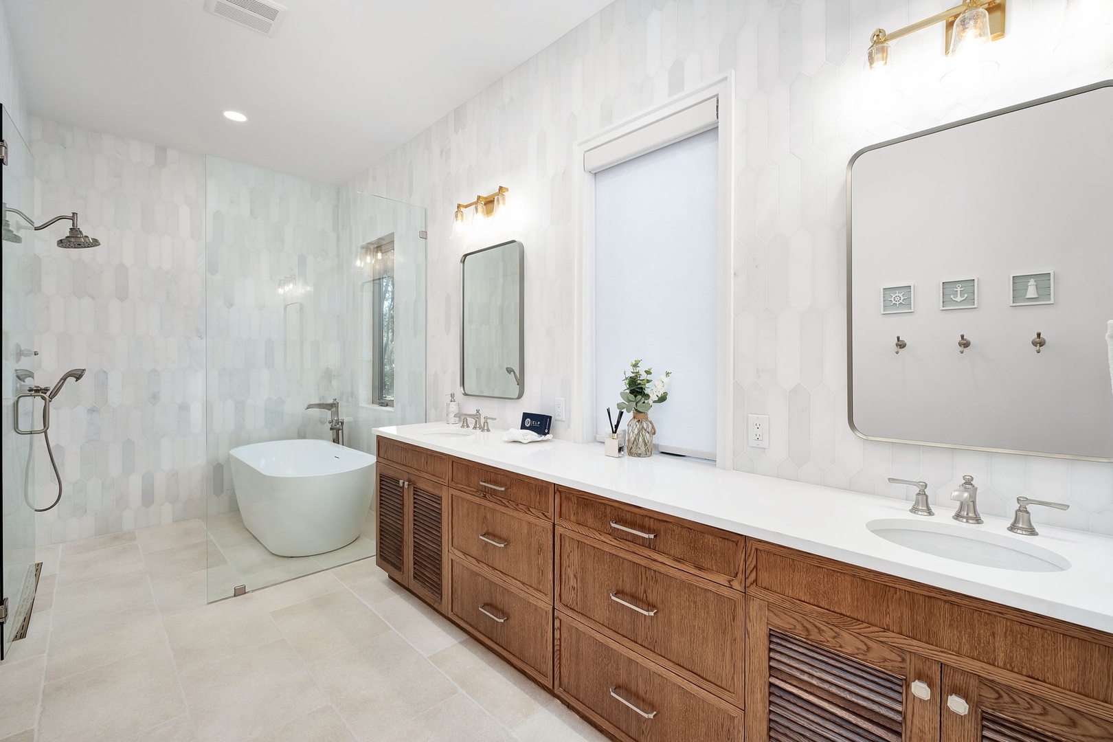 Your luxurious master bathroom features a freestanding soaking tub, spacious walk-in shower, and elegant double vanity with warm wood cabinetry.