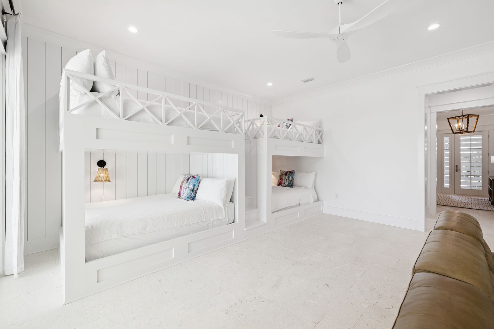 Your kids will love these custom built-in bunk beds with cozy reading nooks and individual lighting for bedtime stories.