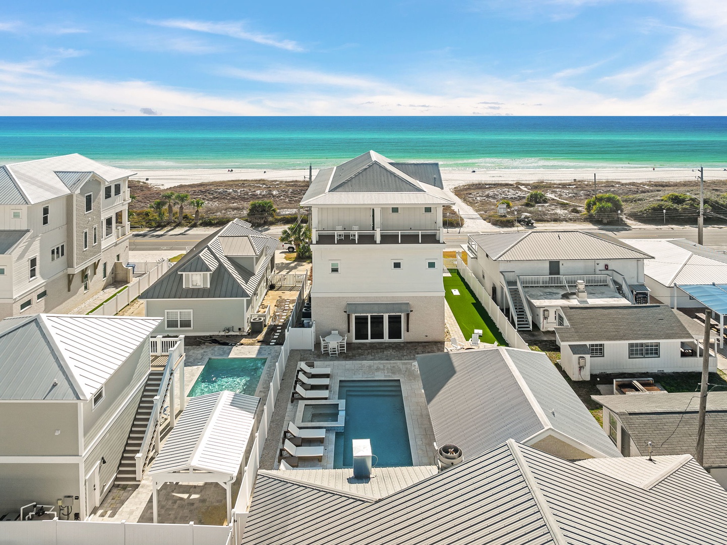 Stunning gulf-view property featuring a private pool and easy access to pristine white sand beaches along the emerald coast.