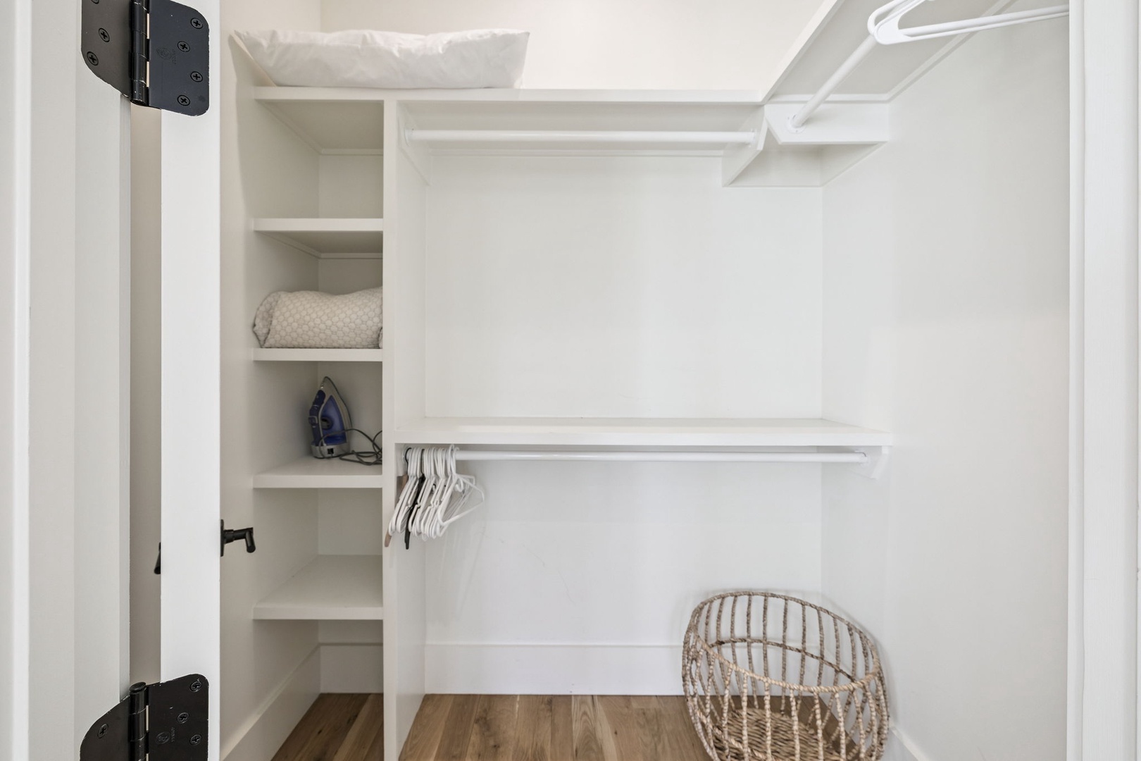 Your private walk-in closet offers plenty of hanging space and built-in shelving to keep your belongings organized during your stay.