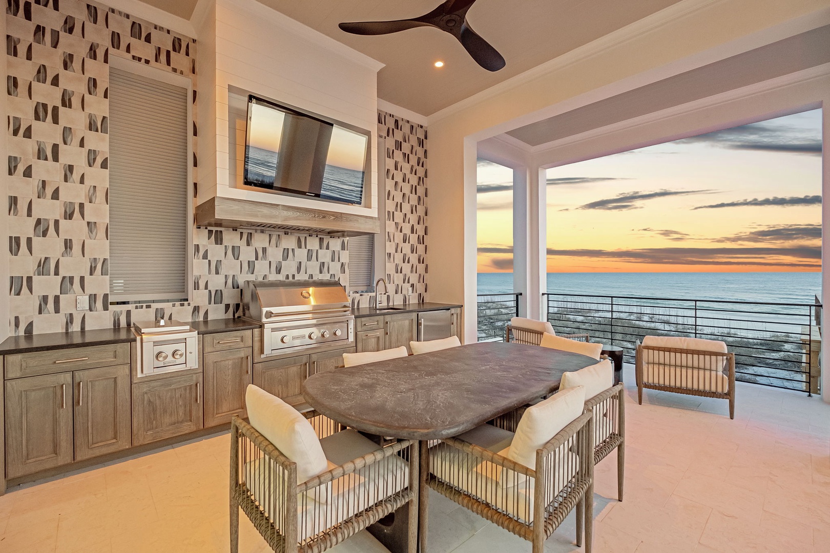 Savor meals in your outdoor kitchen while watching breathtaking sunsets paint the ocean horizon in golden hues.