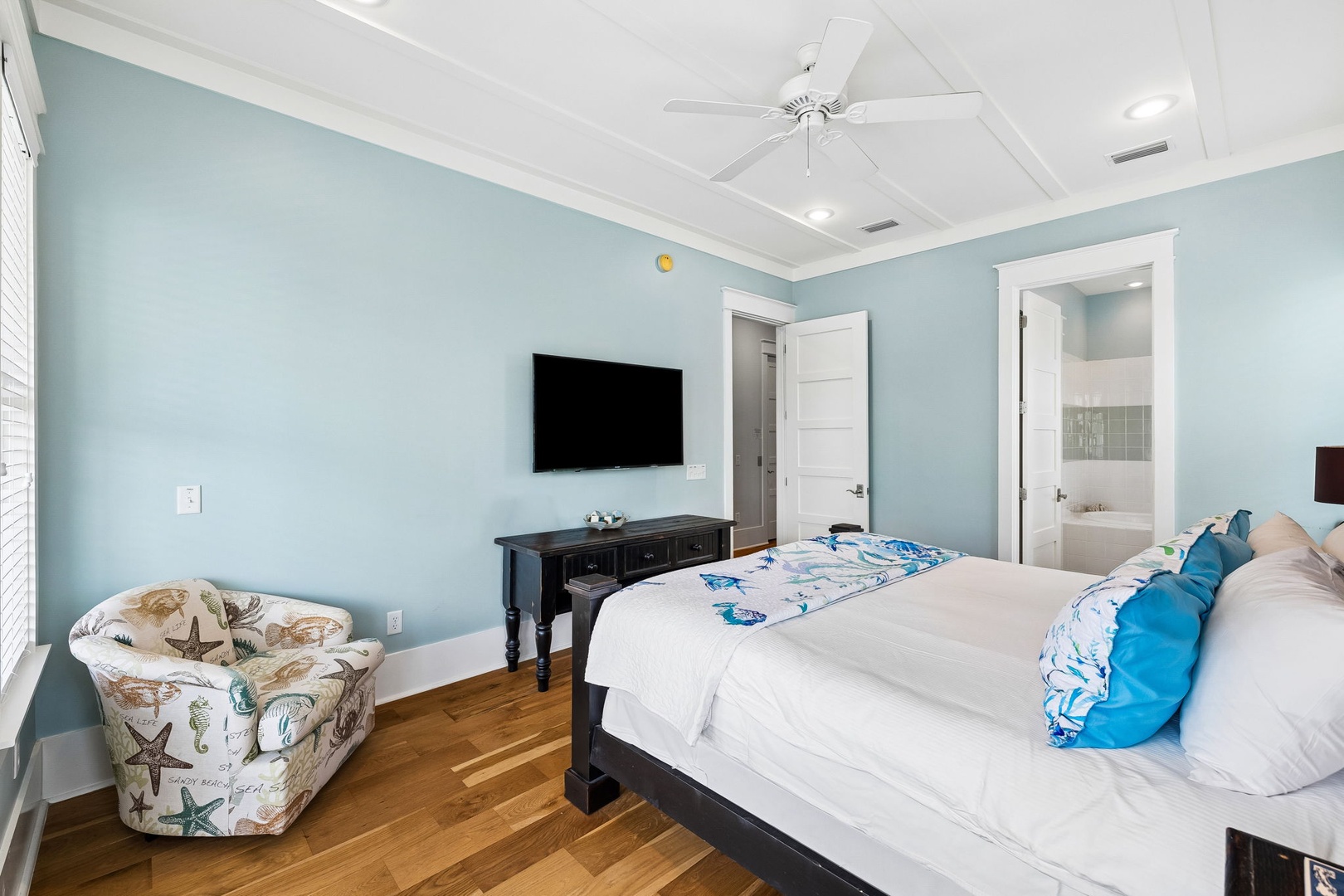 Unwind in your serene bedroom, where soothing coastal hues and crisp linens invite you to kick back and recharge. Your ensuite awaits just steps away.